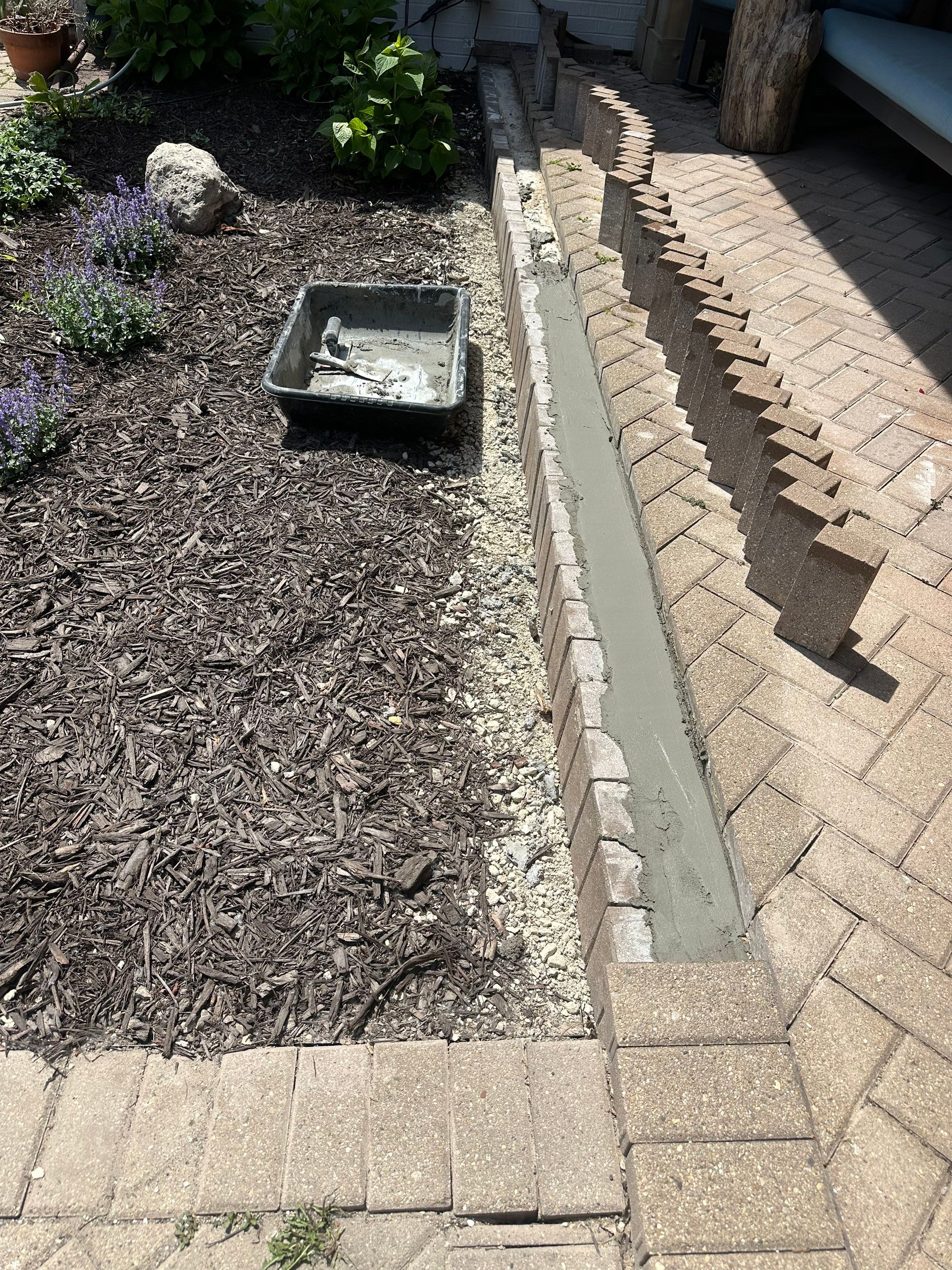 Brick paver repair, cleaning and sealing by Northern Power Washing LLC.
