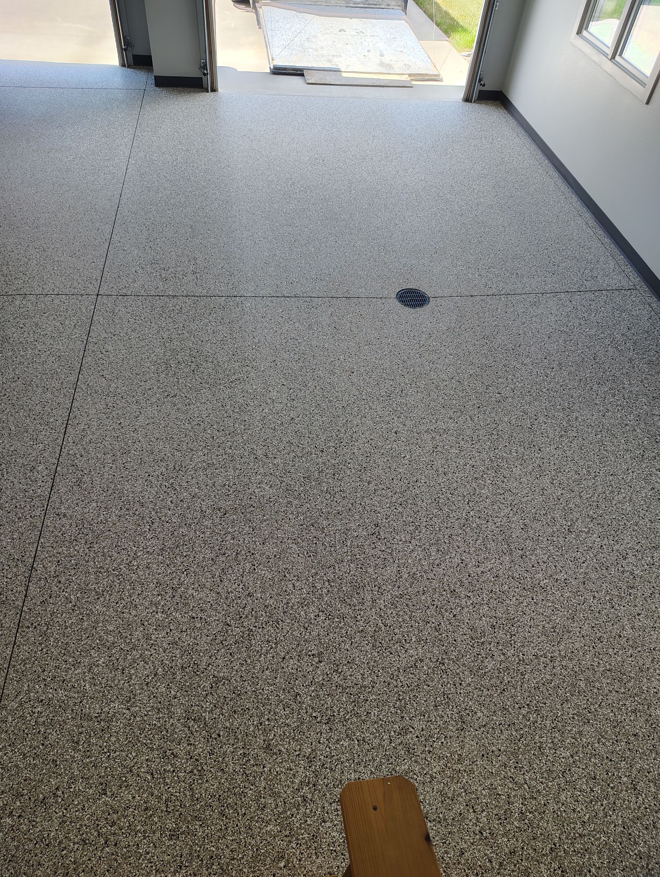 Multi-Car Garage Concrete Coating and Crack Repair in Dell Rapids by Select Painting, Coatings & Garage Cabinets