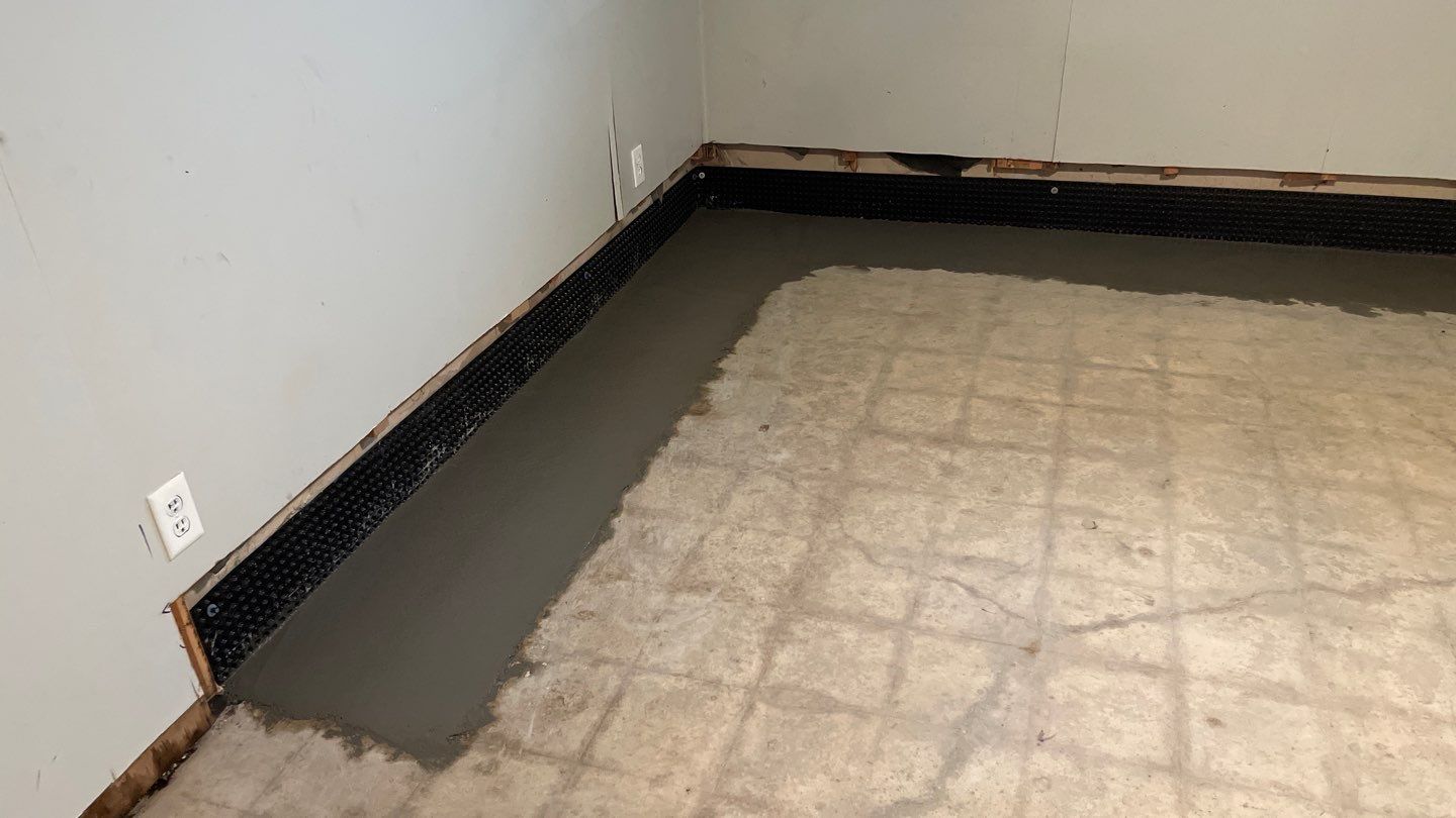 Basement Drain Tile & Sump Pump in Northeast Minneapolis by Waterproofing Northeast