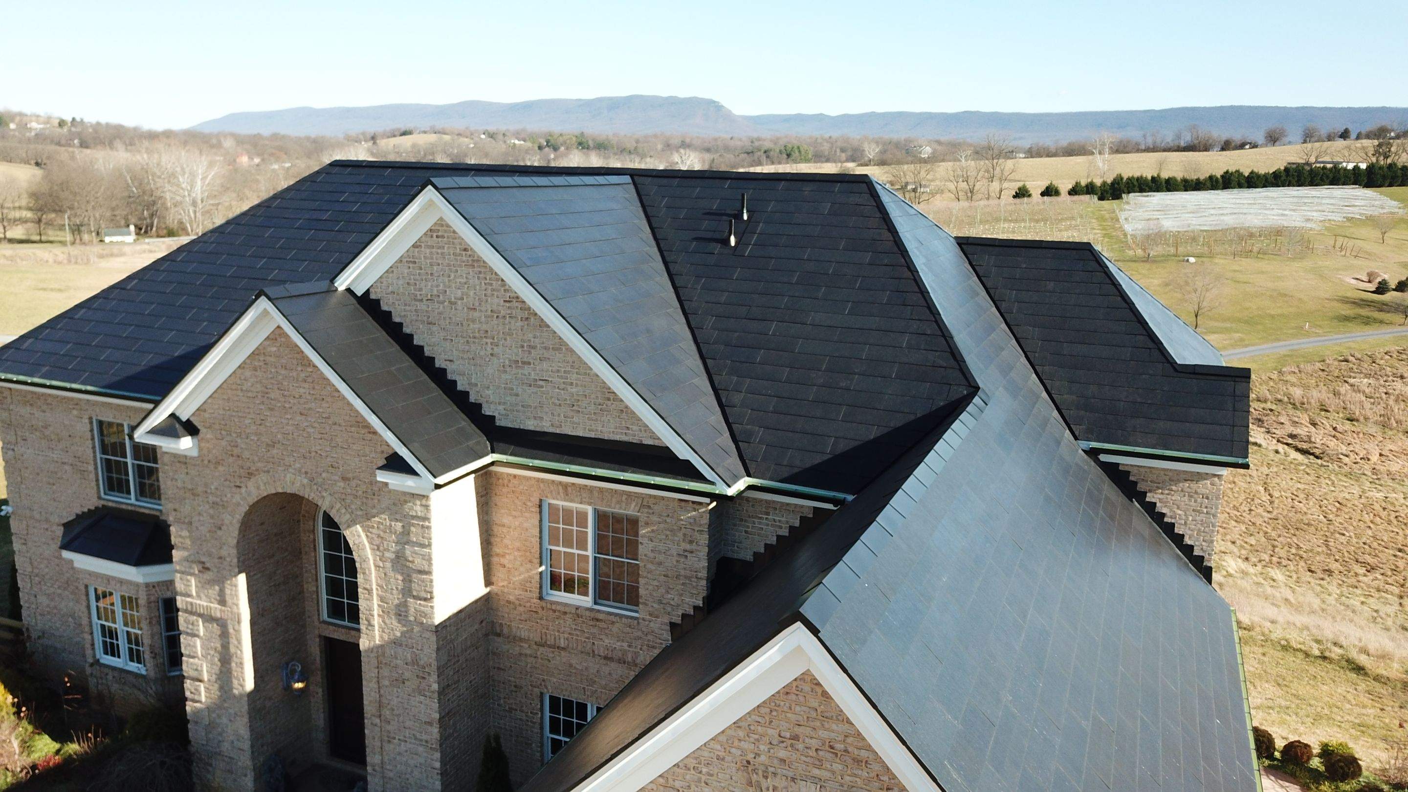 Tesla Solar Roof Replacement  by American Home Contractors
