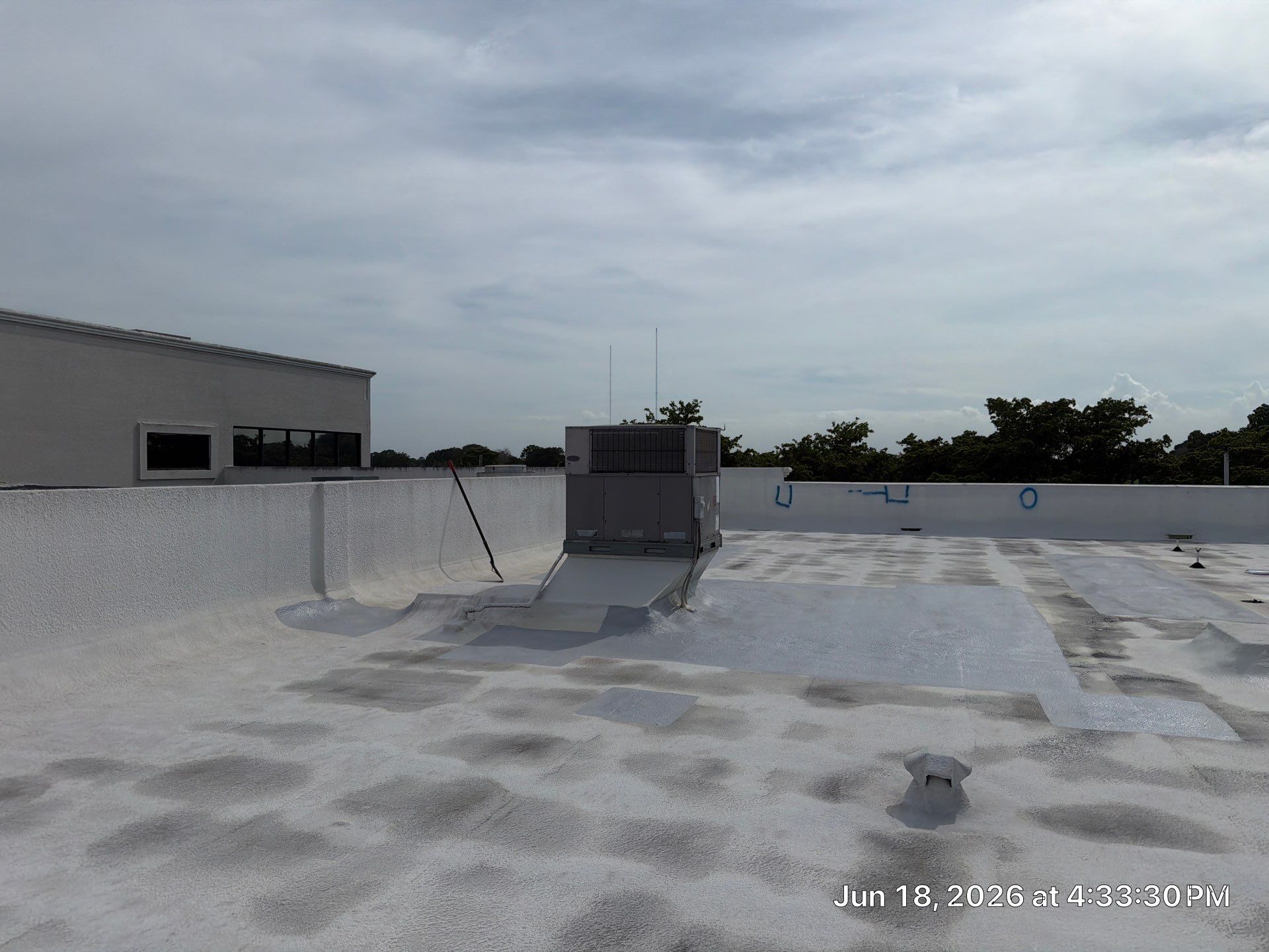Commercial Flat Roof Restoration and Elastomeric Waterproofing in Delray Beach by Roof King LLC