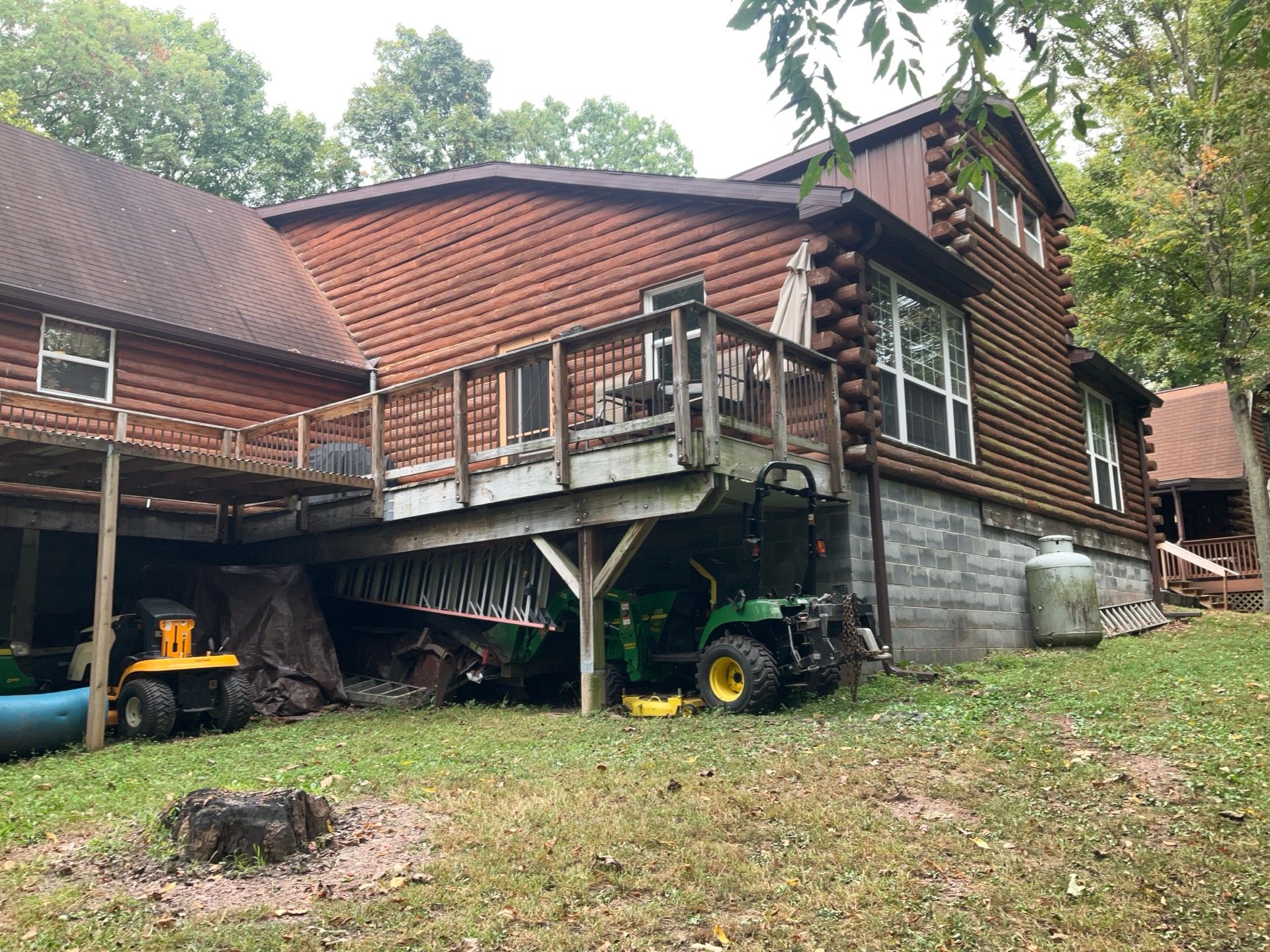 Log Cabin Standing Seam Metal Roof and Skylight Replacement by Esh Builders