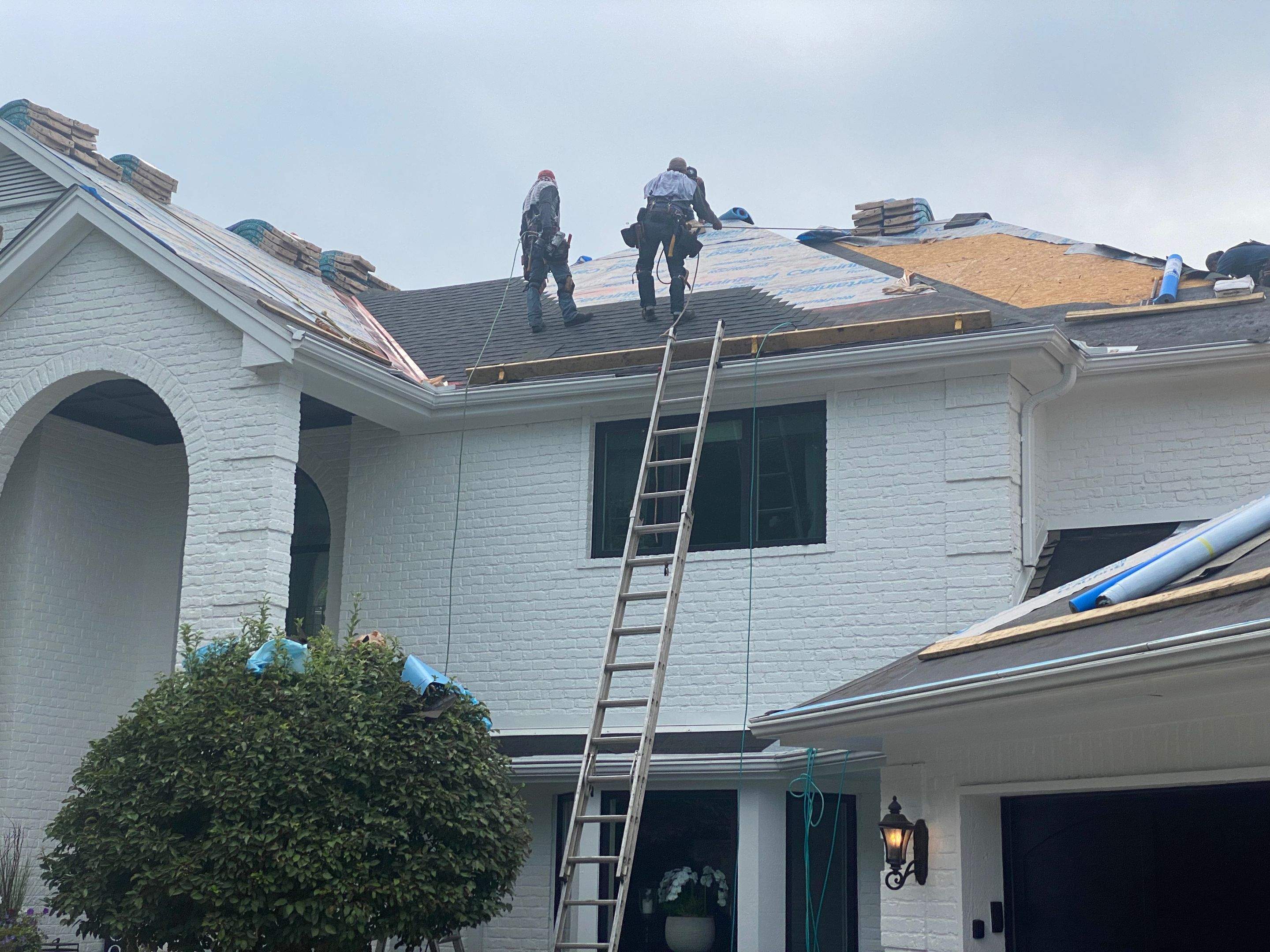 Residential Roofing Installation using Certainteed Landmark Moire Black by MODERN EXTERIOR SYSTEMS