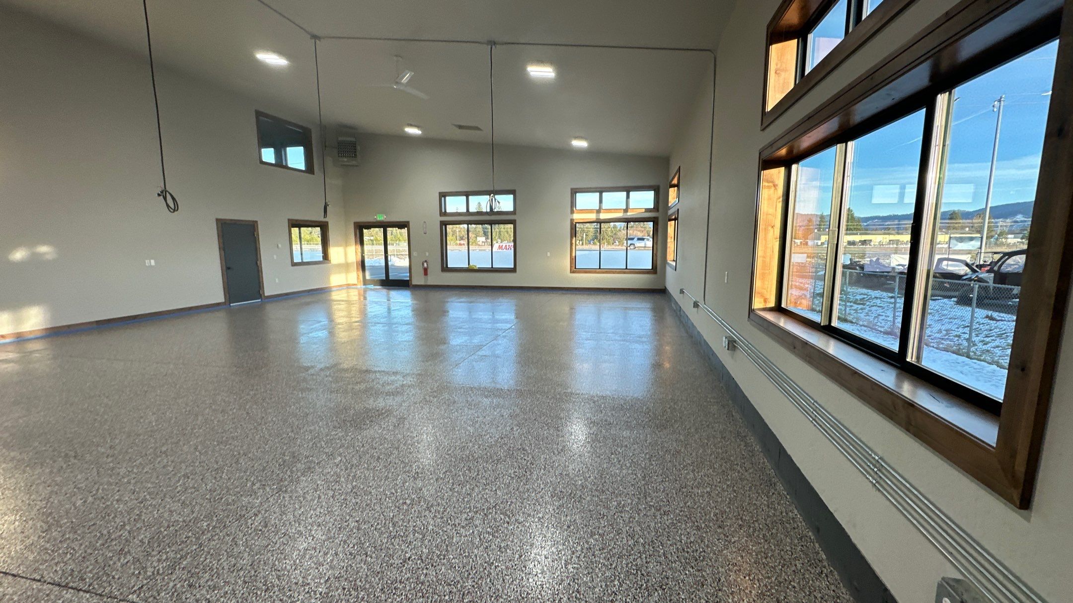 Maximum Exposure Commercial Floor using Domino w/ 5% Cherry Bomb Red  by Croc Coatings, LLC