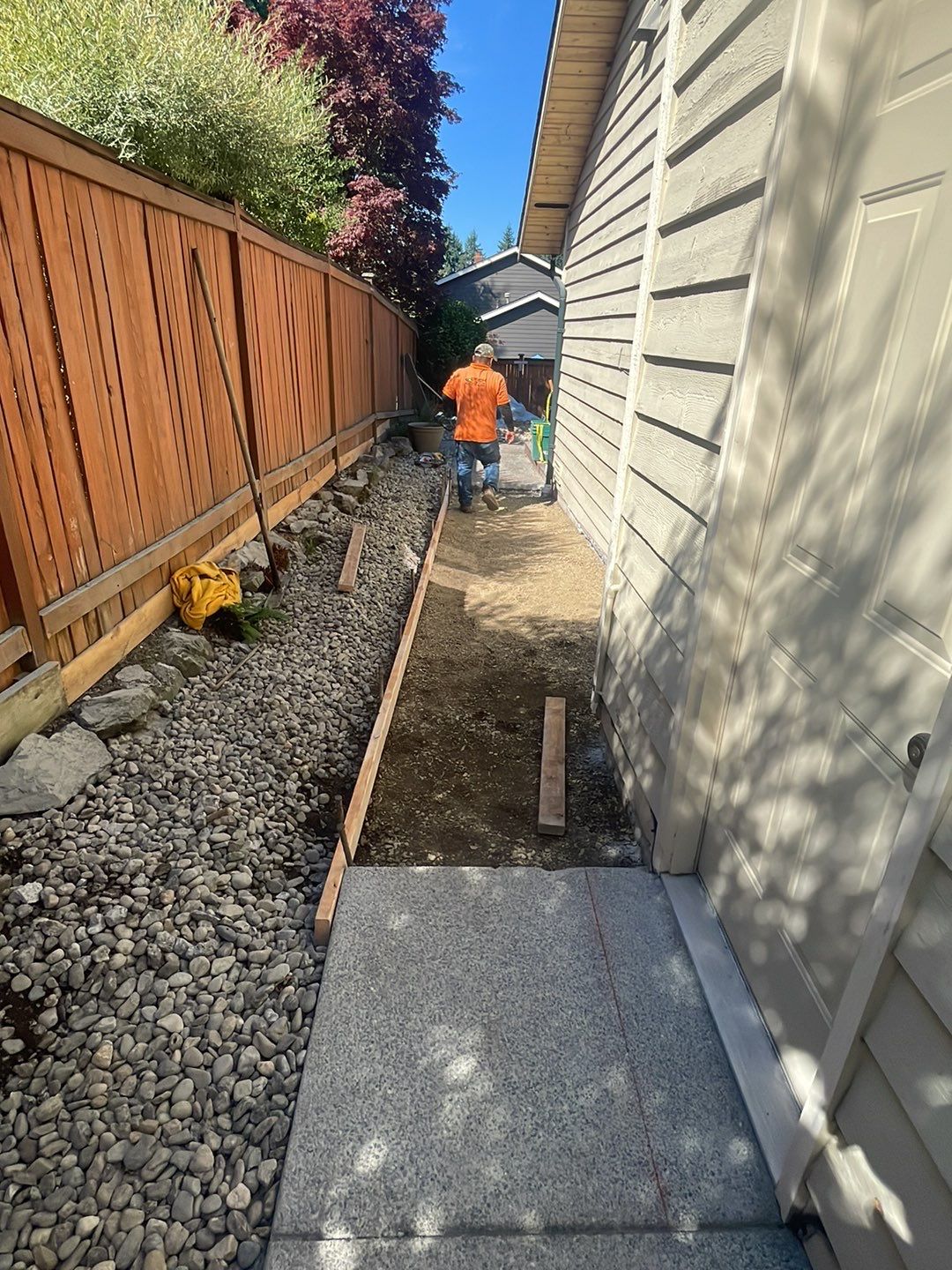 Joan | Concrete Driveway & Walkway   by Jireh Asphalt & Concrete Inc 