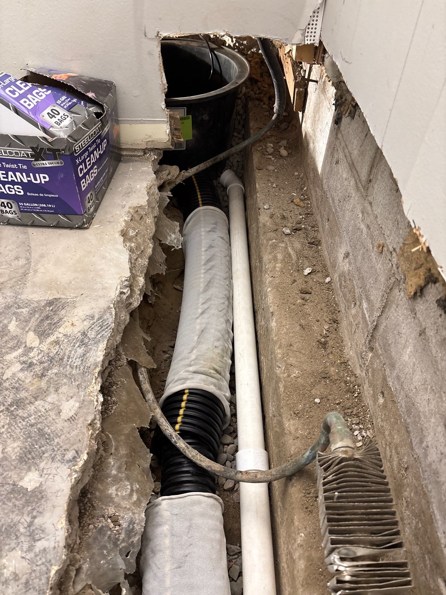 Drain tile and sump pump for George by Waterproofing Northeast