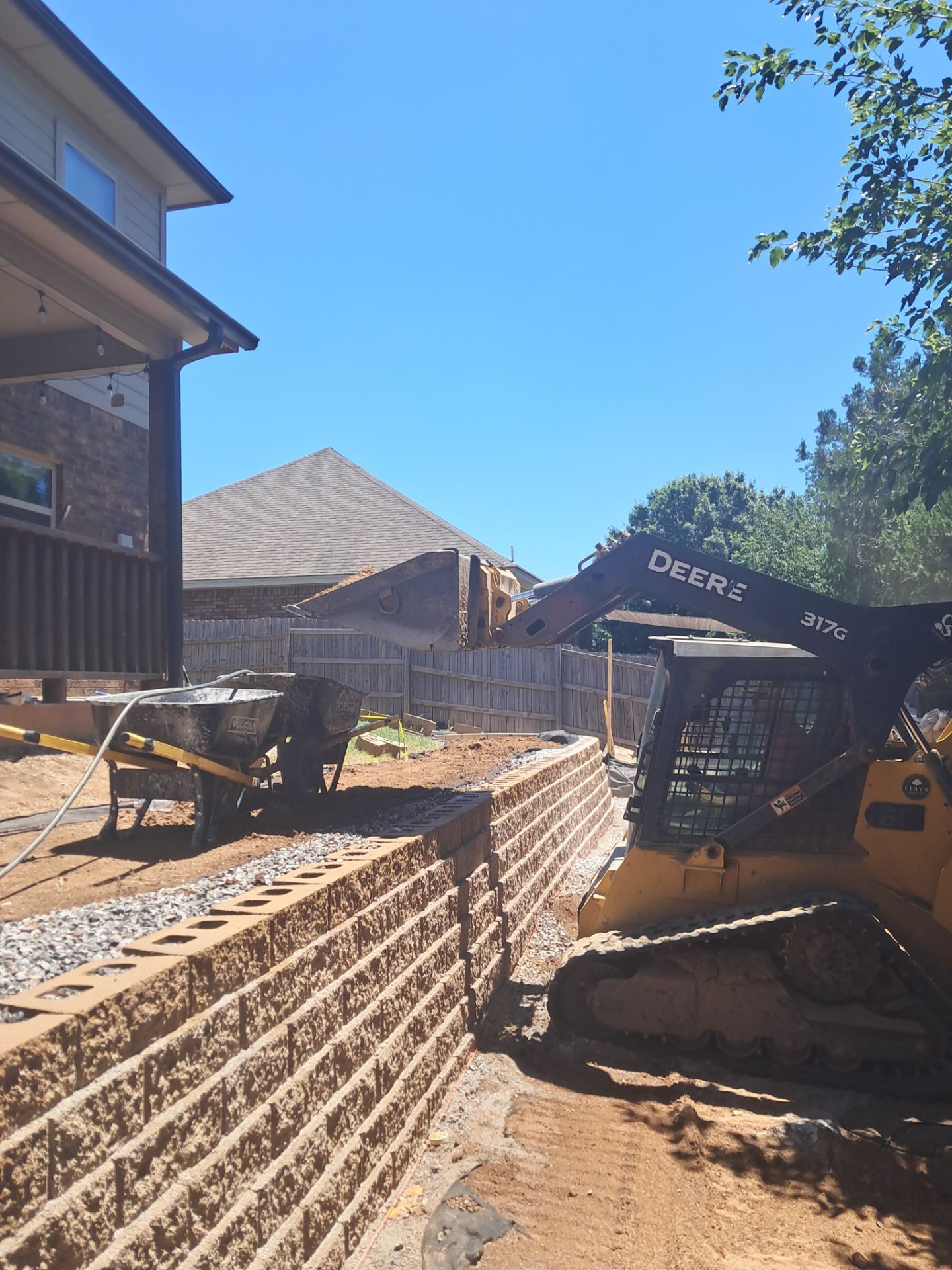 Custom Segmental Block Retaining Wall and Sod Installation in Lawton by Clays Services Inc