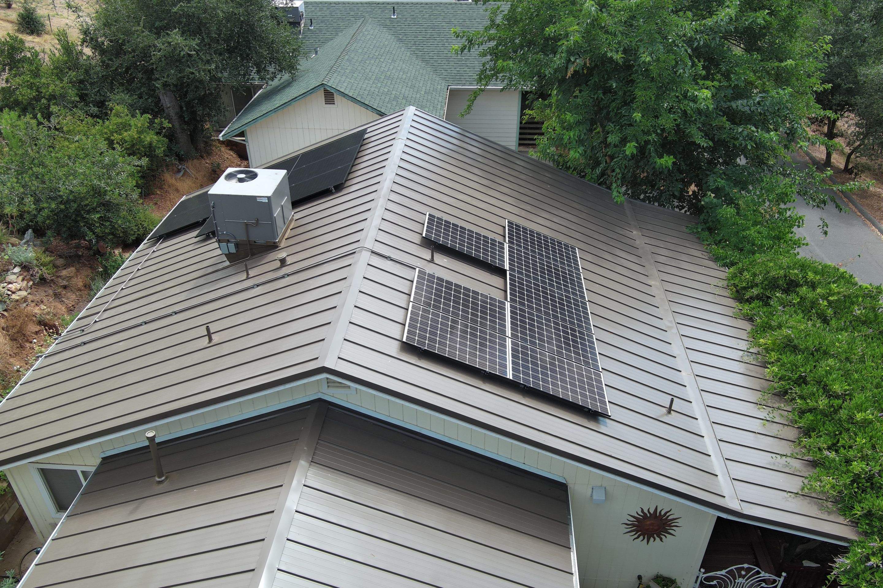 Metal roofing installation using ASC Standing Seam metal by Straight Edge Roofing Inc