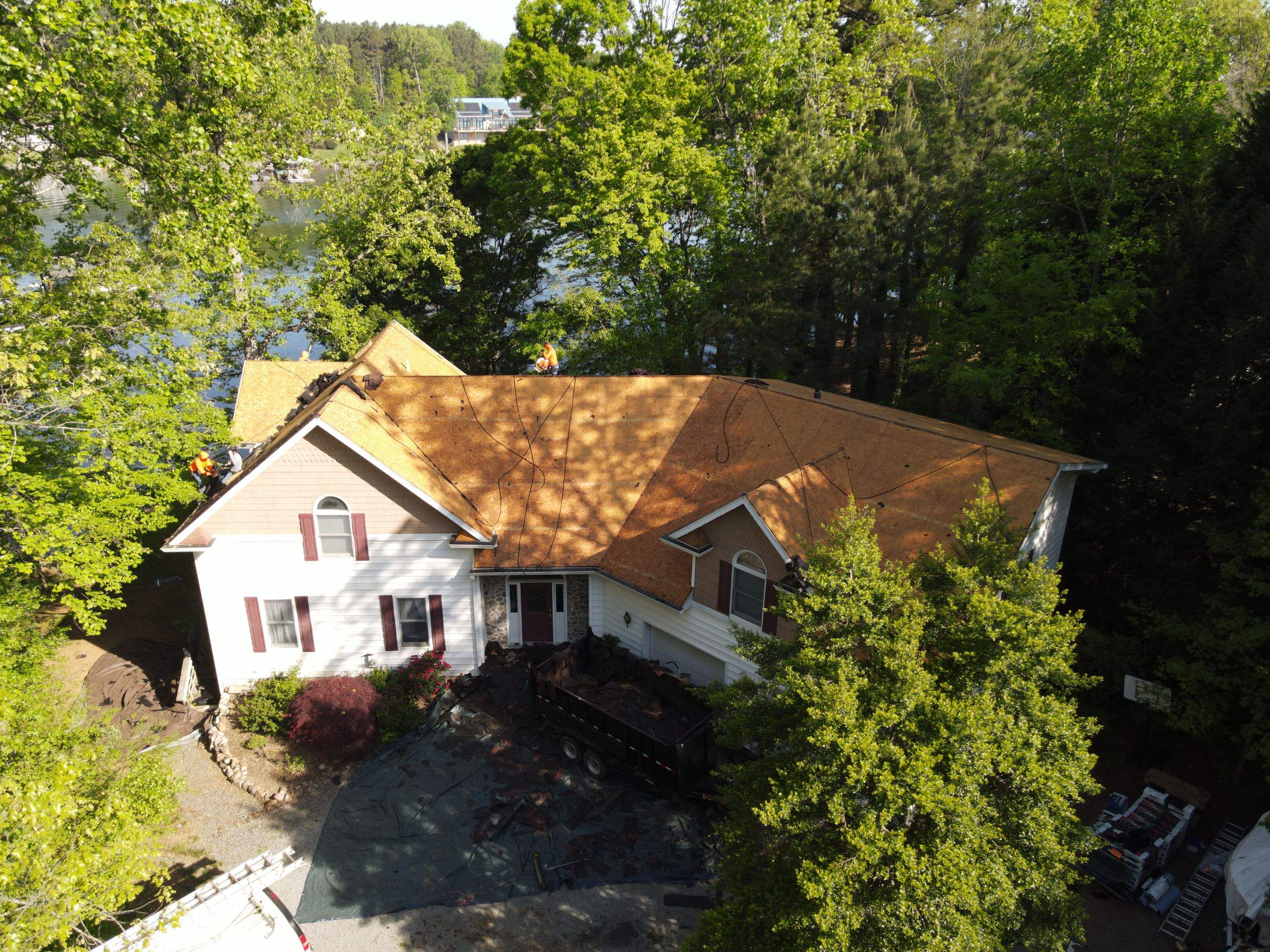 Residential Roofing Installation using  TAMKO Titan XT Rustic Redwood by RISE Roofing & Restoration, LLC