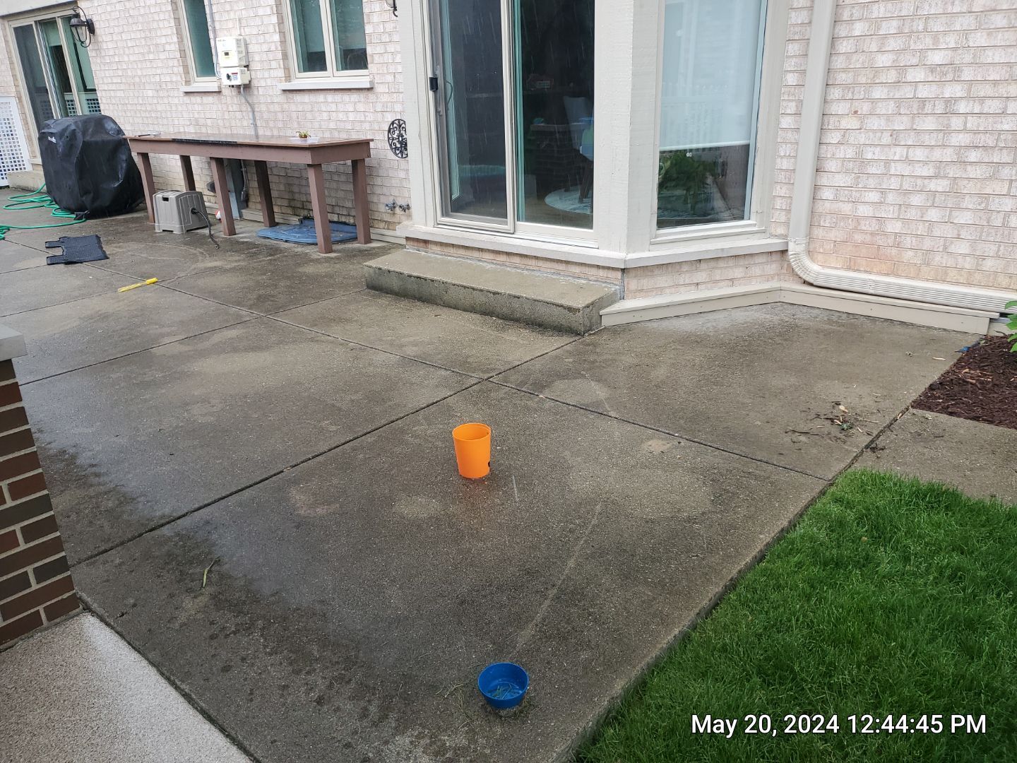 concrete power washing Algaecide, soft wash soap by Northern Power Washing LLC.