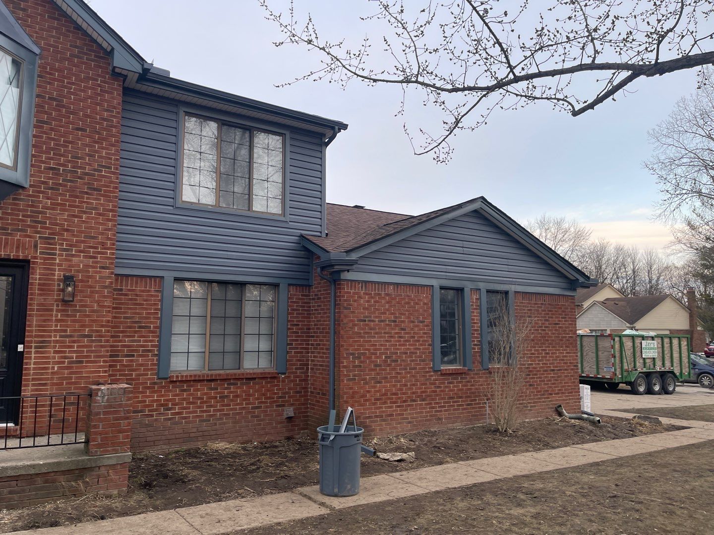 Siding Replacement using Monogram Dutchlap Siding by 180 Contractors