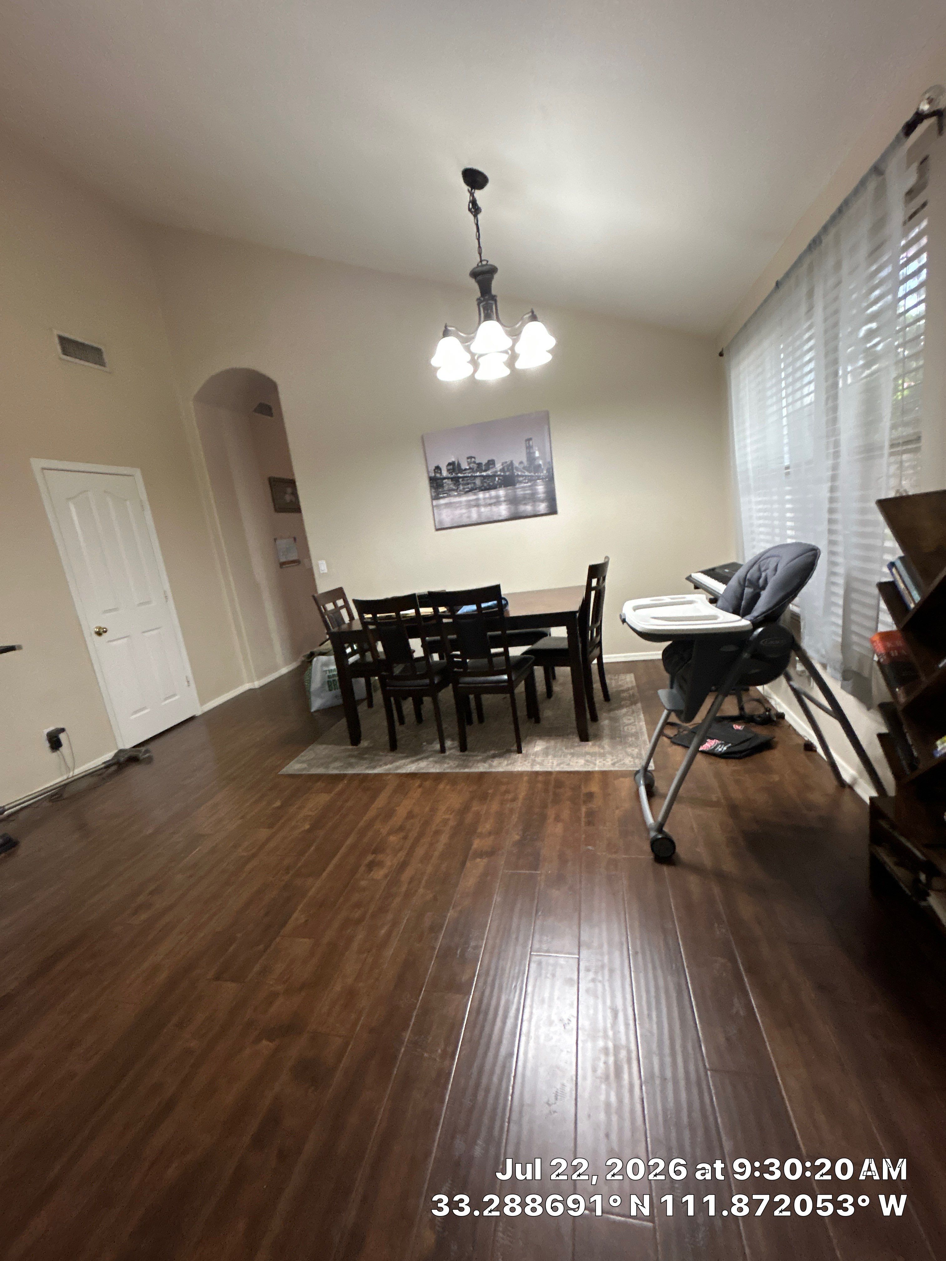 Dark Wood Floor Installation for Chandler Dining Room Renovation by CompanyCam Sales Demo
