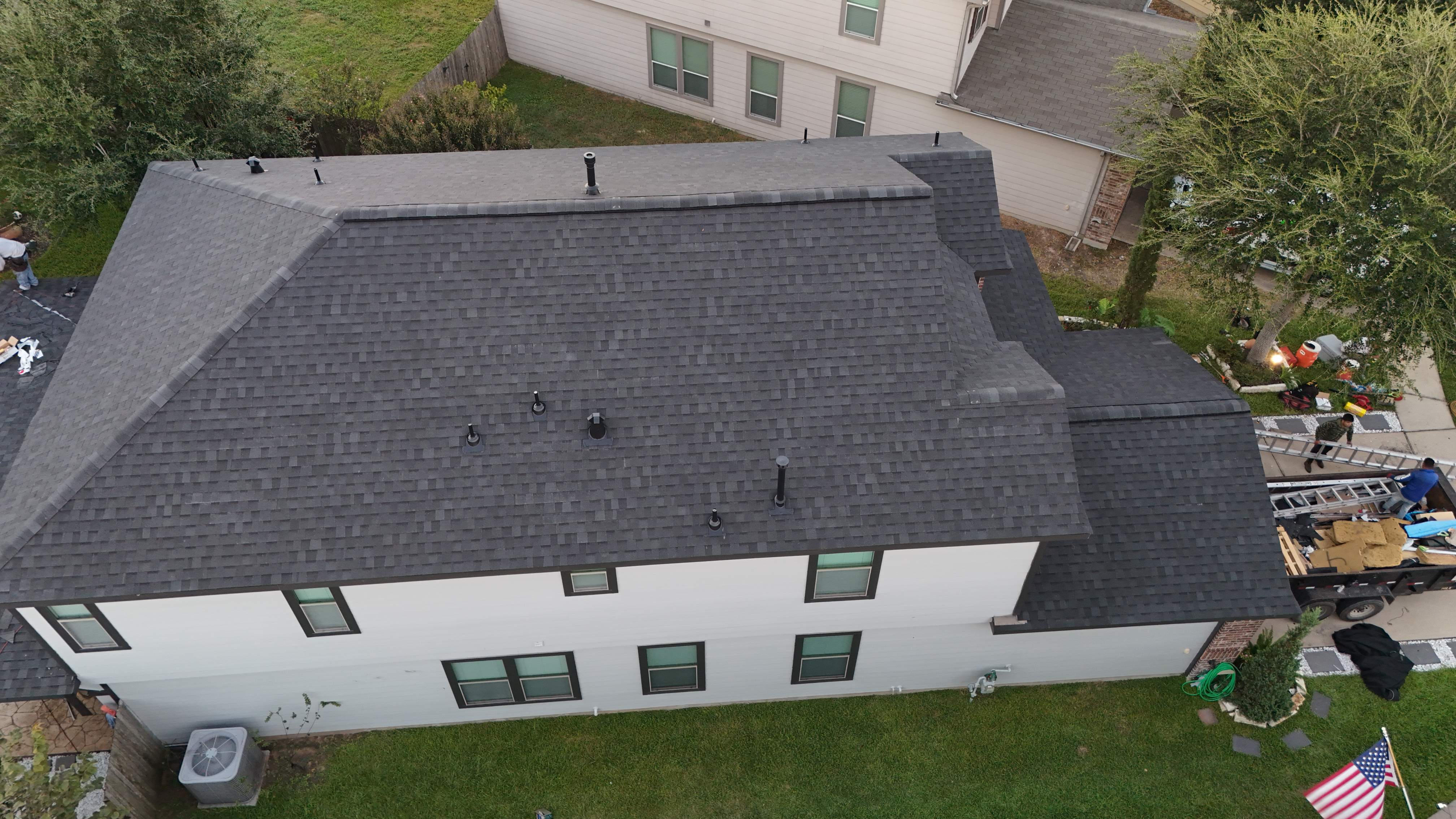 Charcoal Roof on Modern Farmhouse — Cypress, TX by PL Roofing & SB Roofing, LLC.