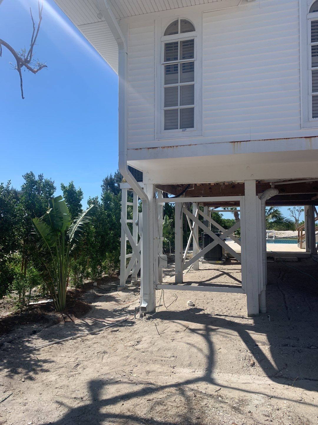 Downspout Installation using Downspout Extension in Sanibel FL by Gutter Professors