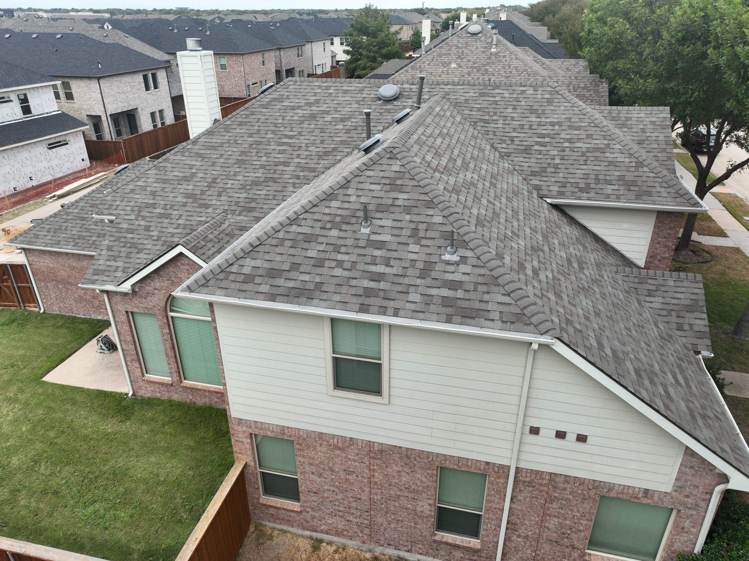 Residential Roofing Installation using Owens Corning TruDef Duration Storm Driftwood by OneSource Roofing and Restoration