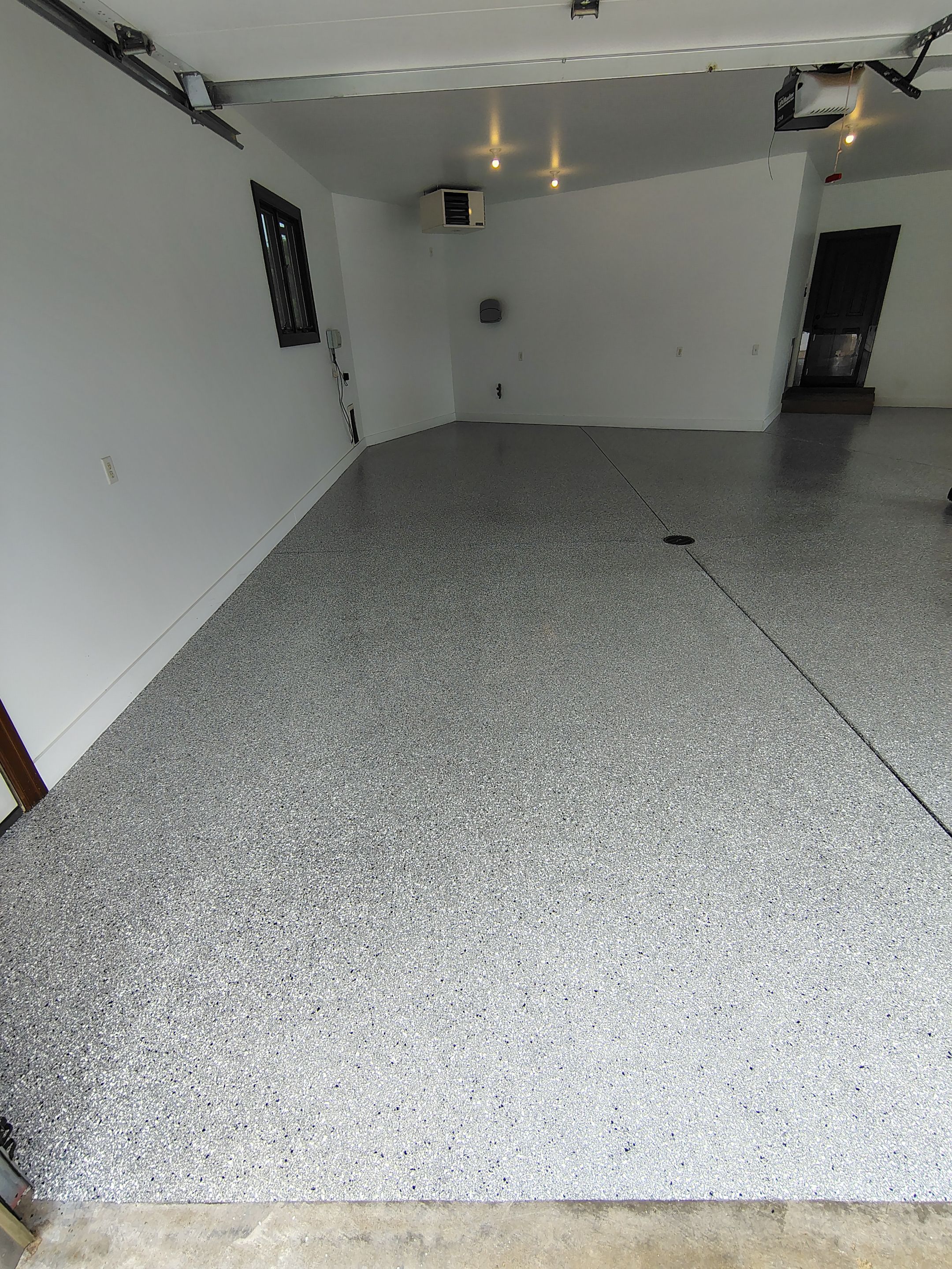 Feather Grey Floor Coating in Sioux Falls, SD by Select Painting, Coatings & Garage Cabinets