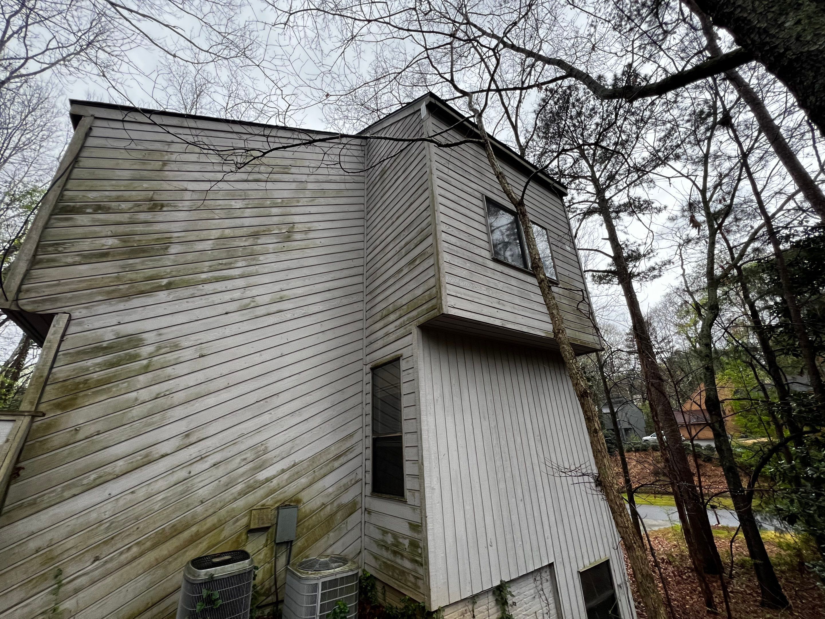 Modern Marietta Home Transformation with Custom Kitchen and Vertical Siding by Swift Home Renovations