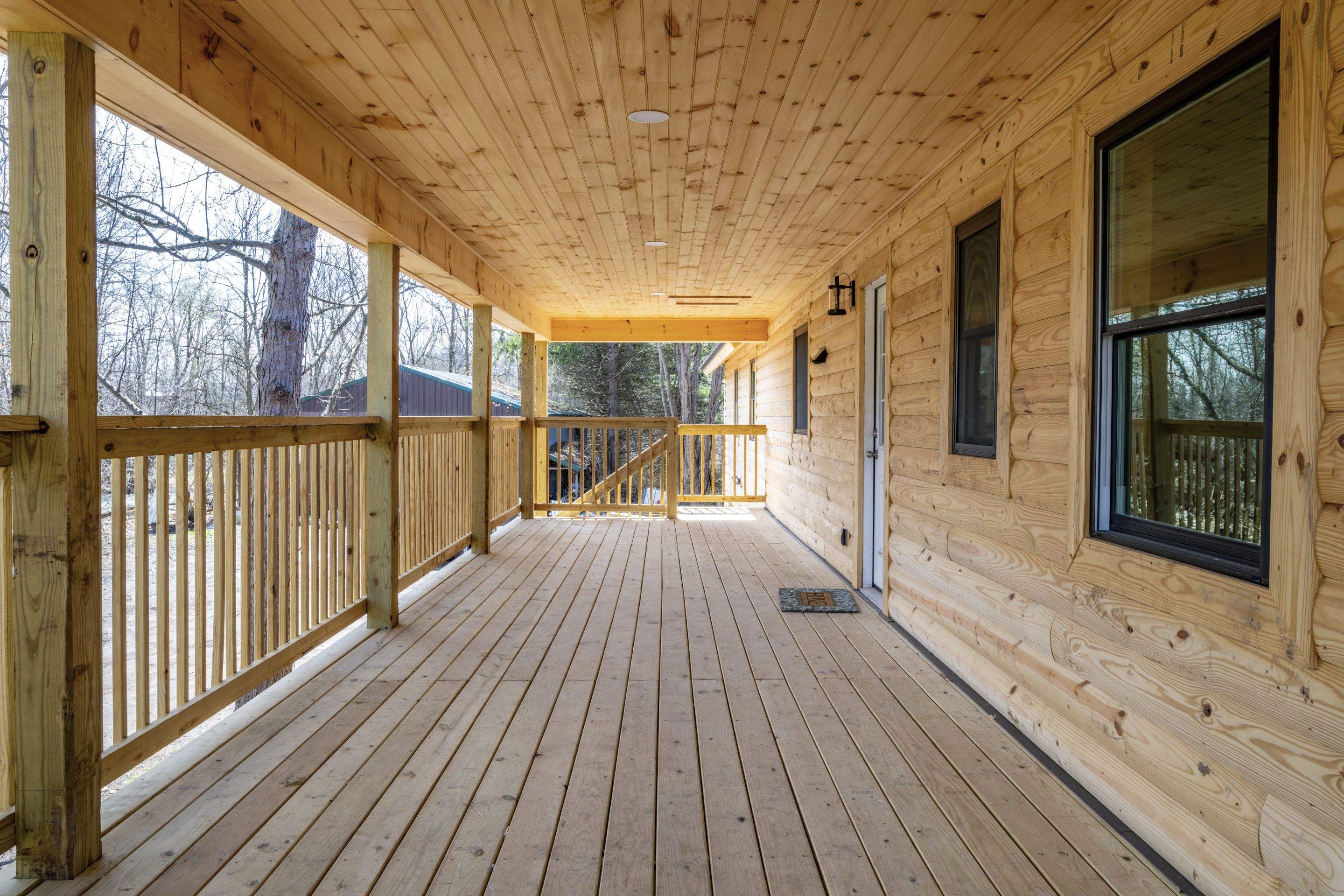 New Addition to Home using Log Cabin Siding  by Horst Custom Homes 