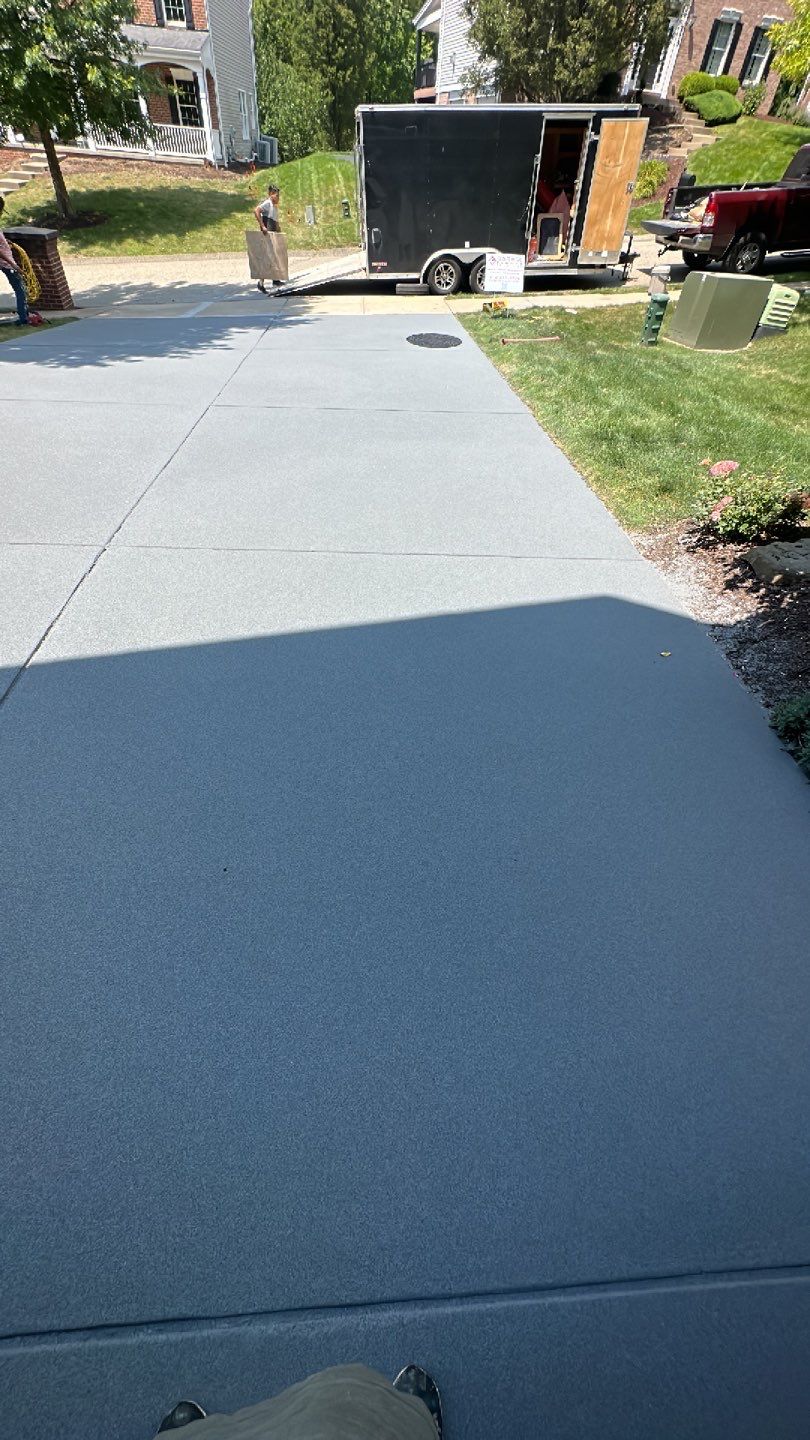 Pool Deck + Driveway + Garage Project in Venetia by Floors in a Day, Inc