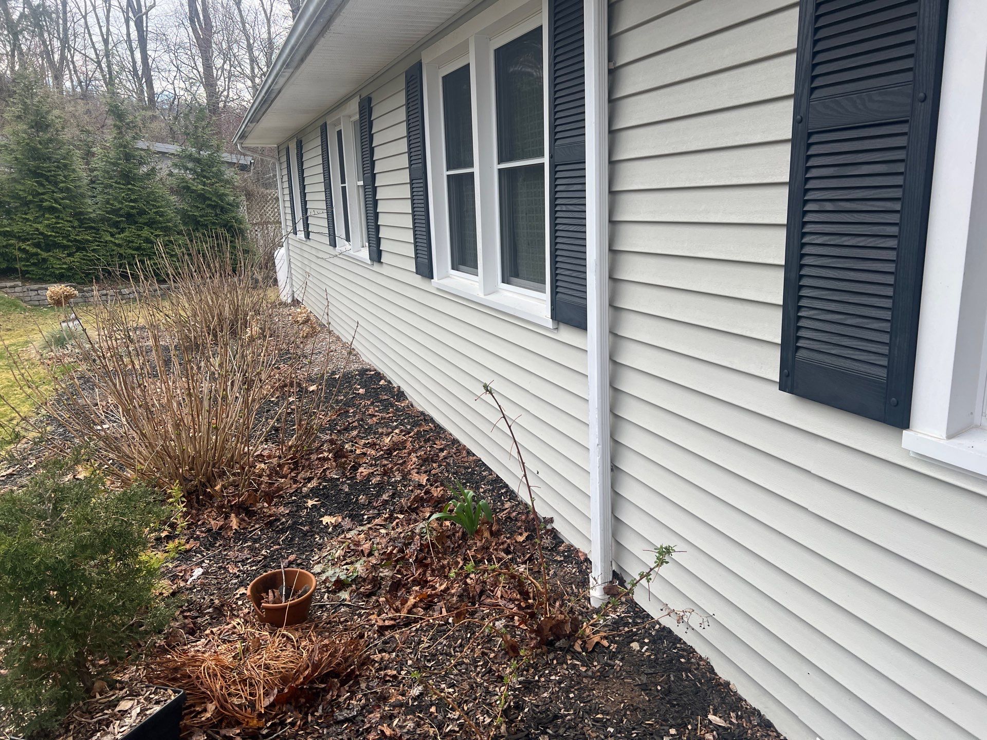 Comprehensive Spring Property Cleanup and Garden Bed Mulching in Orange by Diamond Image LLC