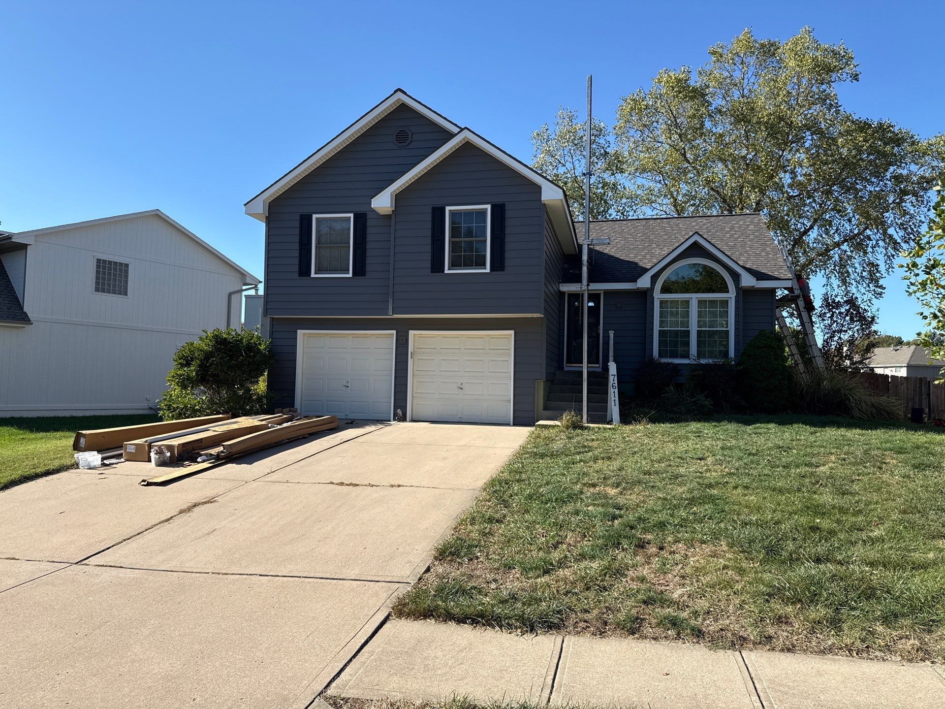 Split Entry in Smokey Ash Craneboard D7 by EEC  Windows, Siding & Roofing 