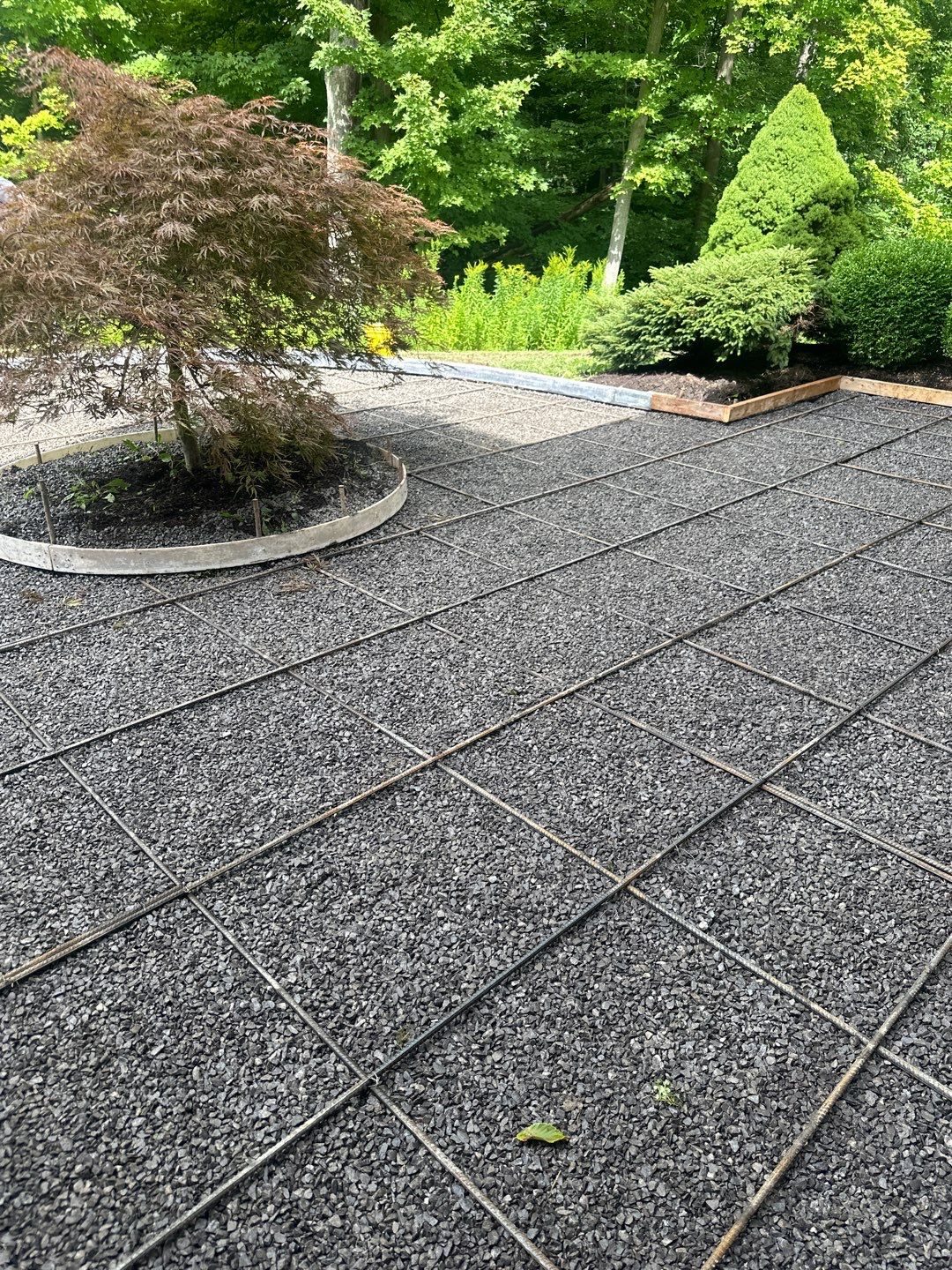 Majestic ashlar stamped concrete patio  by NG Masonry & Construction LLC