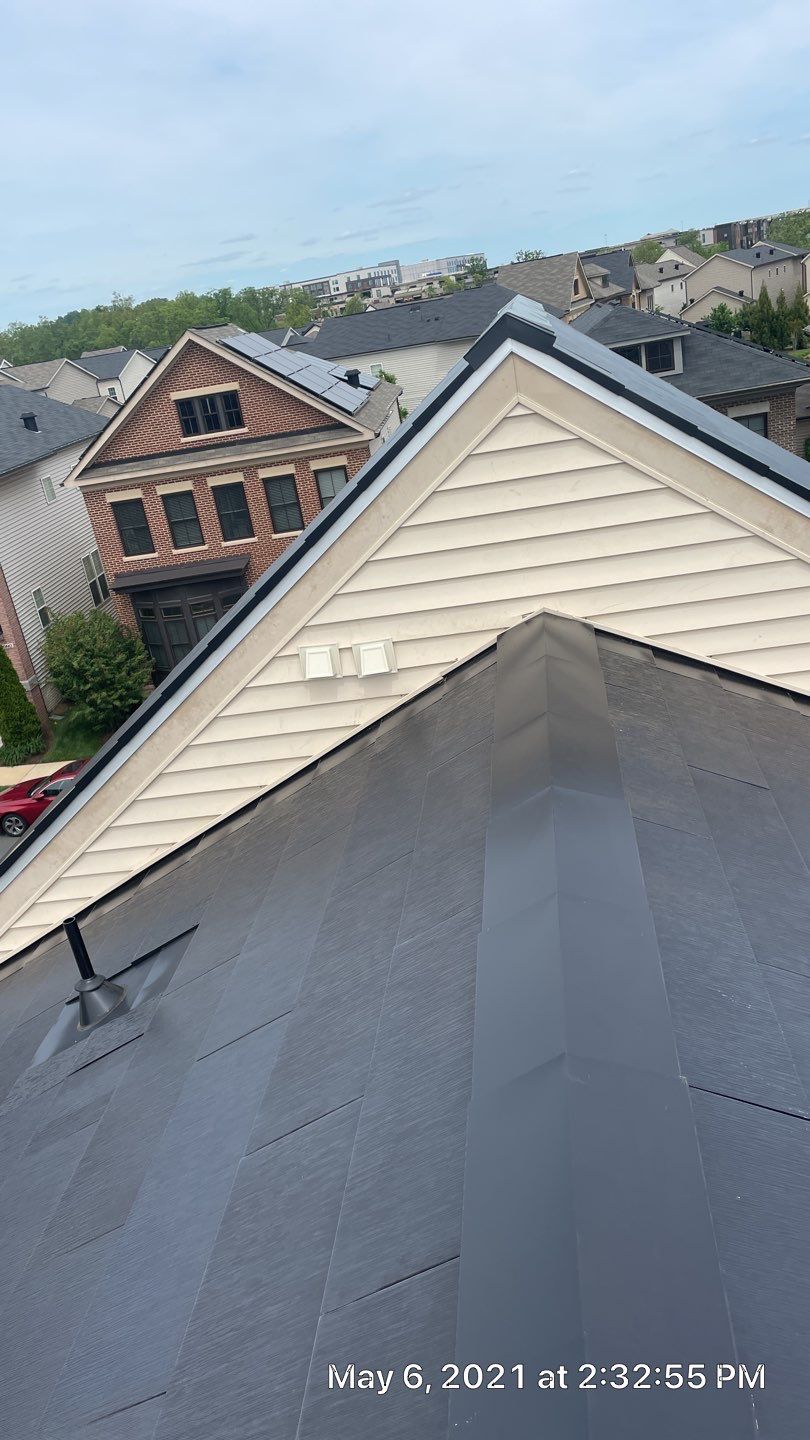Tesla Solar Roof using Tesla Solar Roof V3 tiles by American Home Contractors