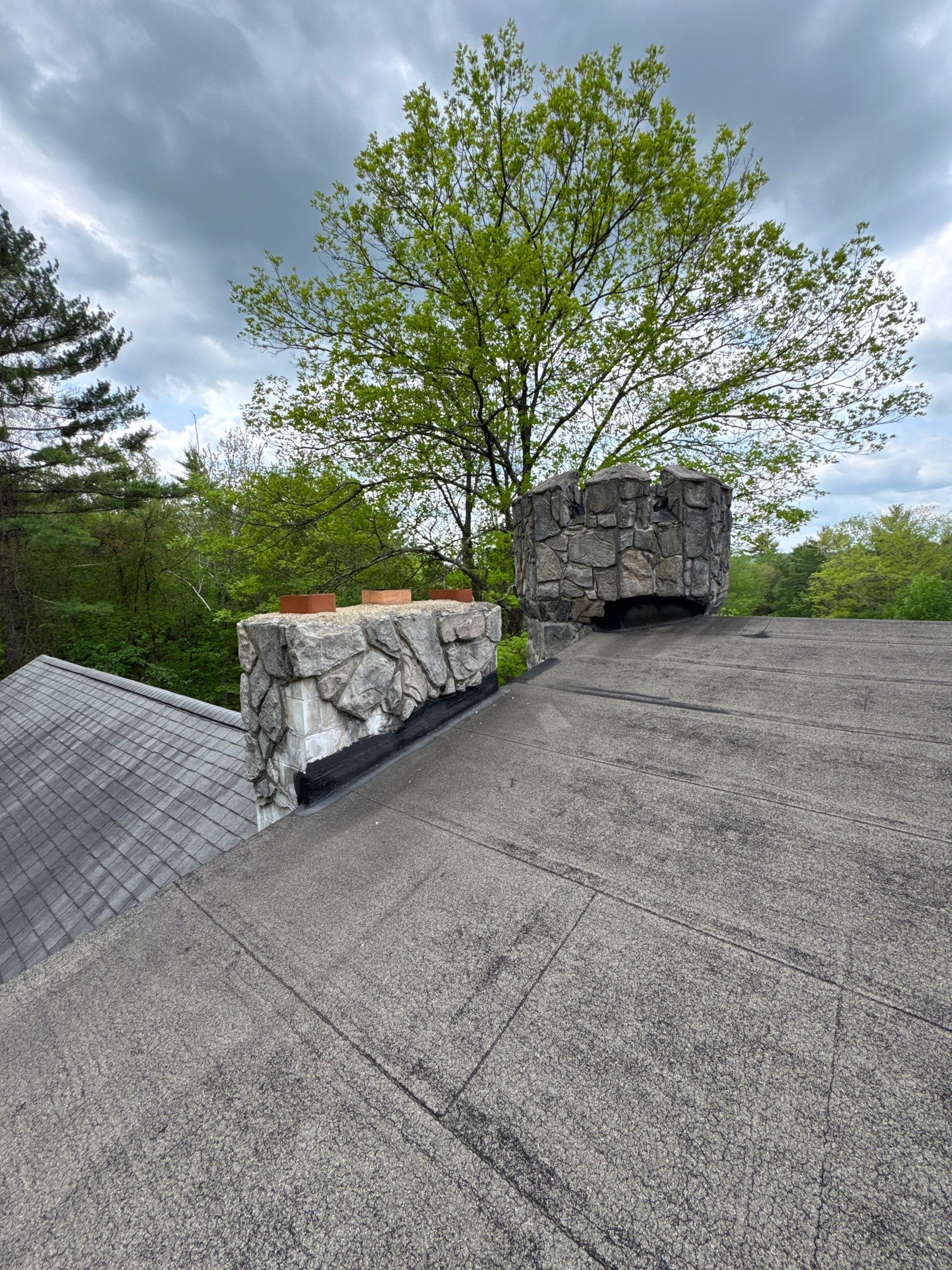 Deerfield, NH Roof Replacement Near Deerfield Fairgrounds with Custom EPDM Rubber Roofing for Stone Turrets by Compass exteriors