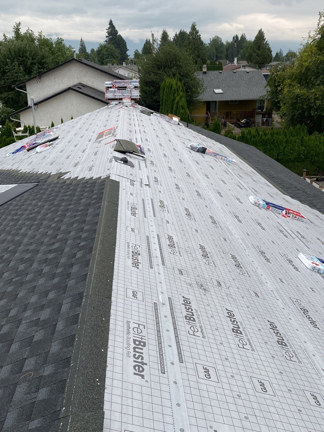 Residential Remodel using GAF Charcoal HDZ by Top Notch Roofing Inc