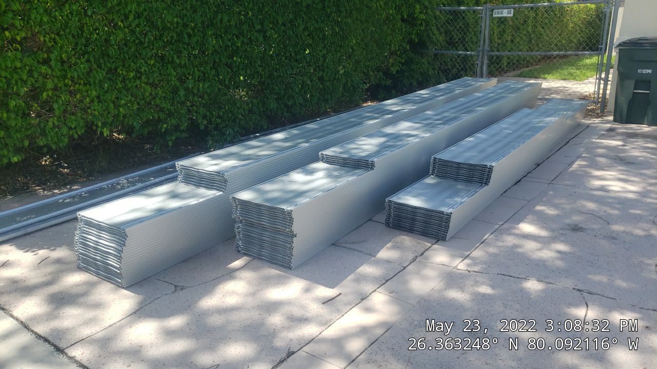 Residential Roofing Installation using 1" Nail strip metal roof by BLUES BROTHERS CONSTRUCTION CORP