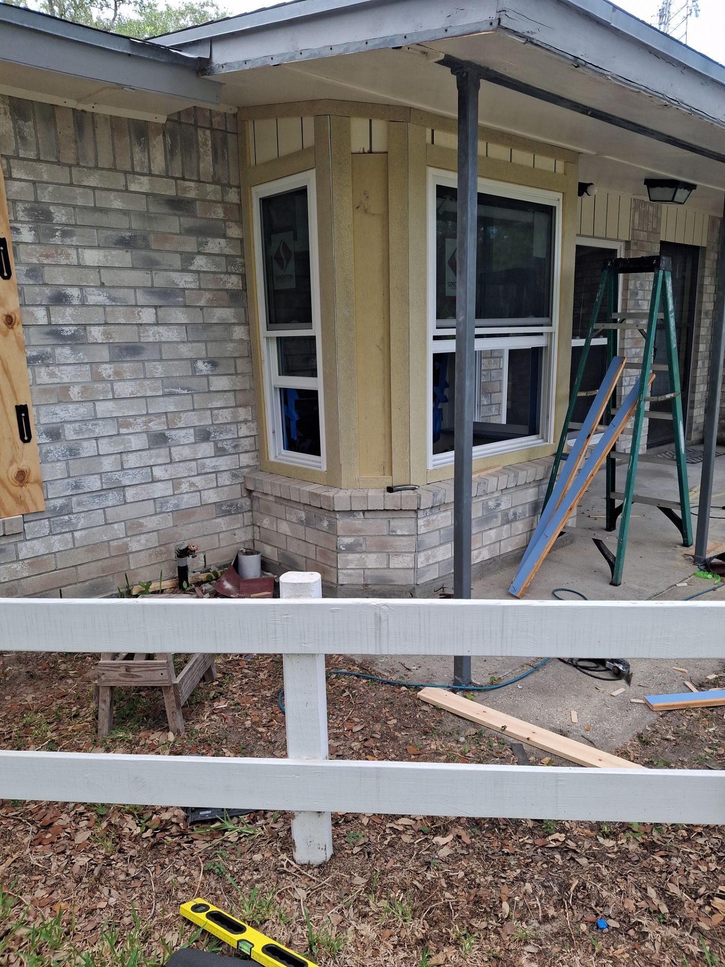 Installing Windows on a Submarine  by Bayfront Roofing and Construction