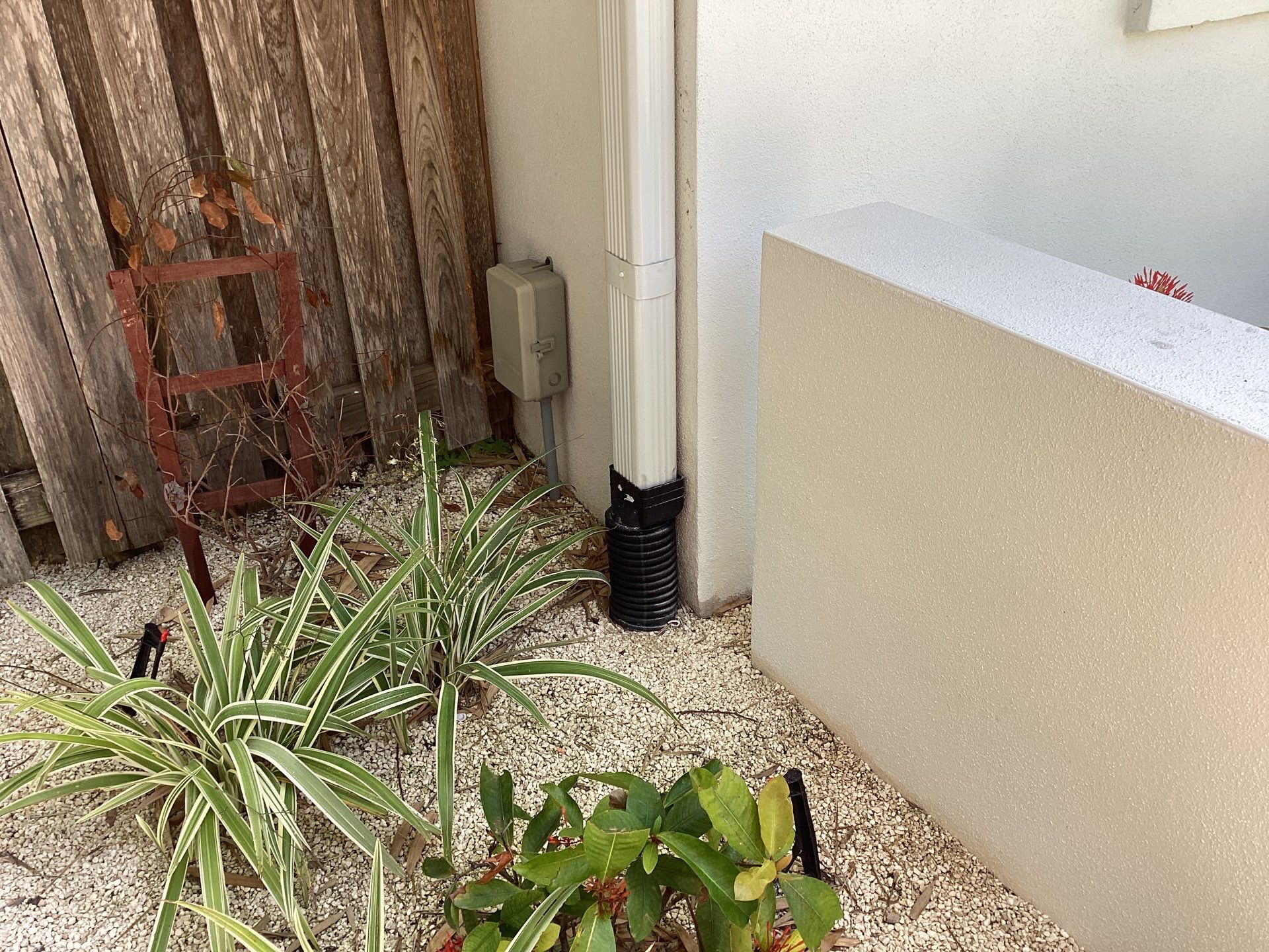 White Seamless Gutters and Downspouts in Sarasota FL by Gutter Professors