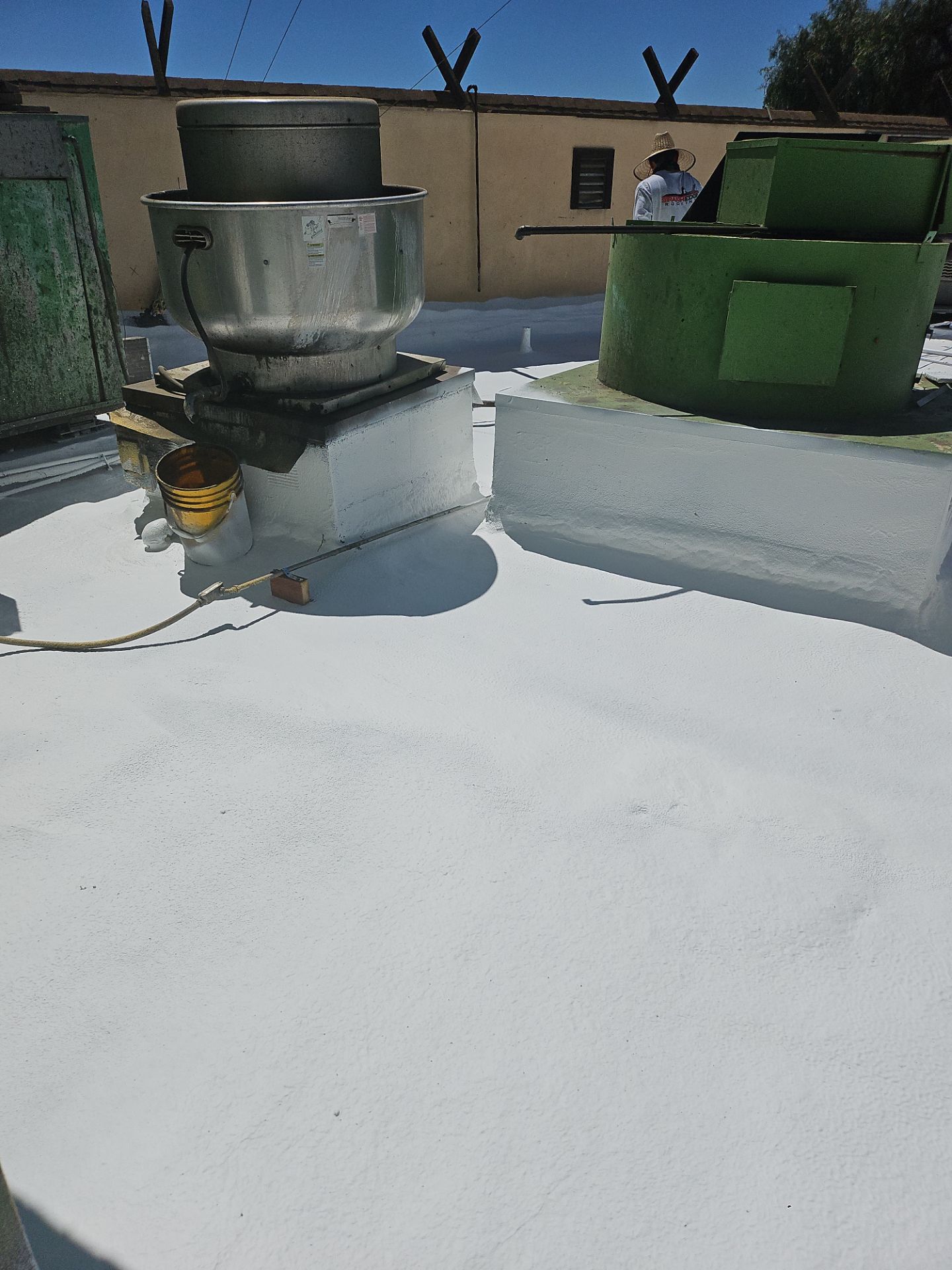 Spray foam and coatings using General Coatings acrylic coatings and spray foam by Straight Edge Roofing Inc