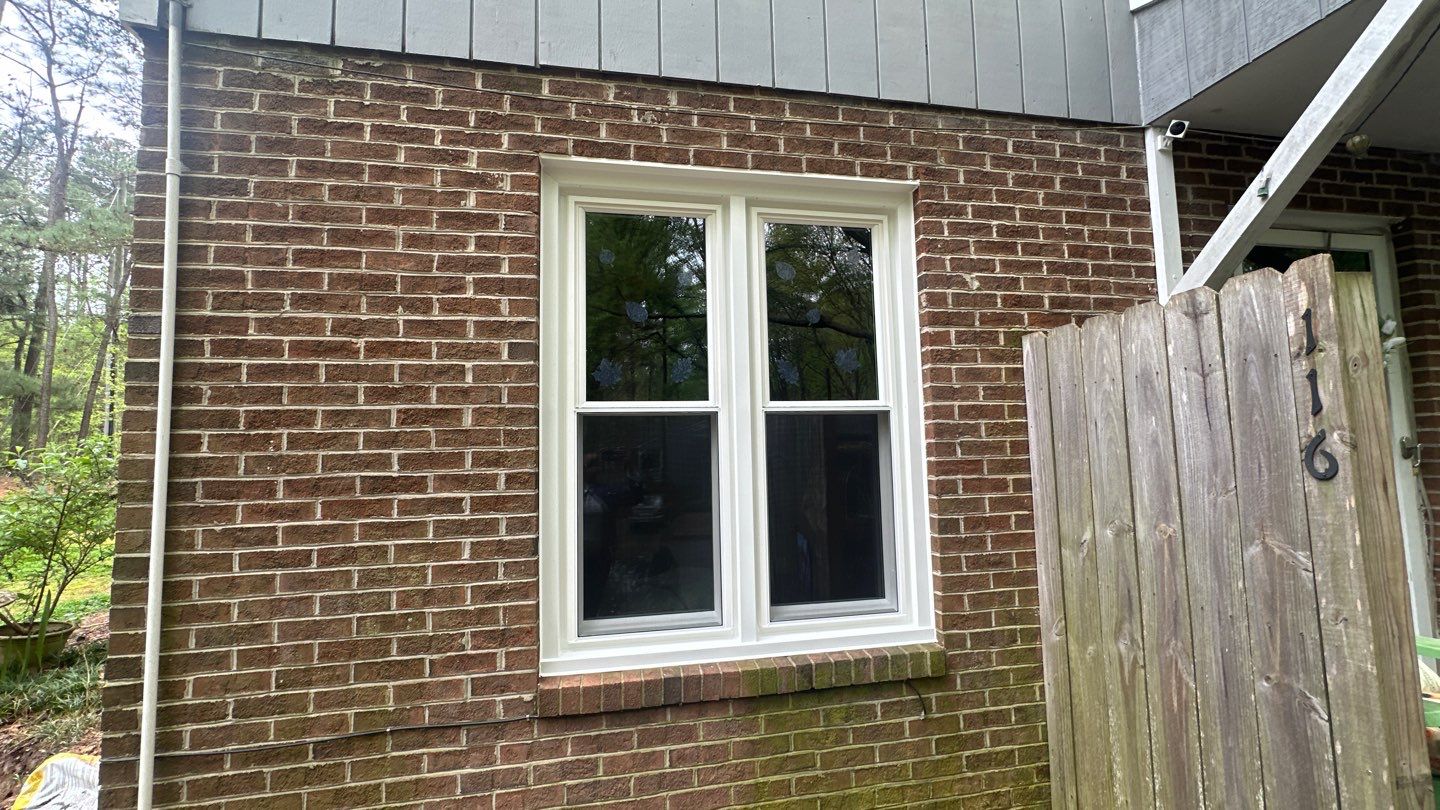 White Vinyl Double-Hung Window Replacement in Fuquay-Varina by The Remodeling Company