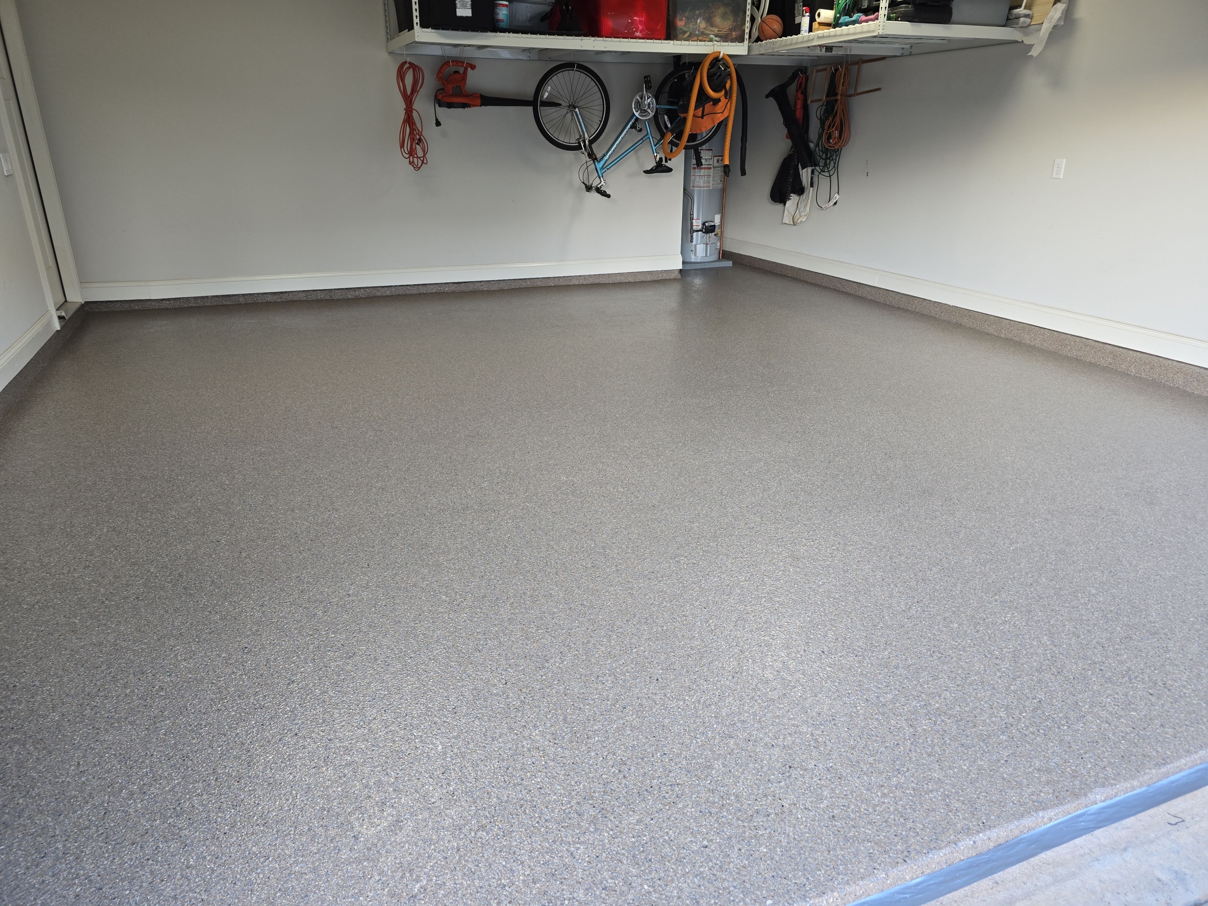 Driveway & Garage Using Obsidian by Elite Floor Solutions