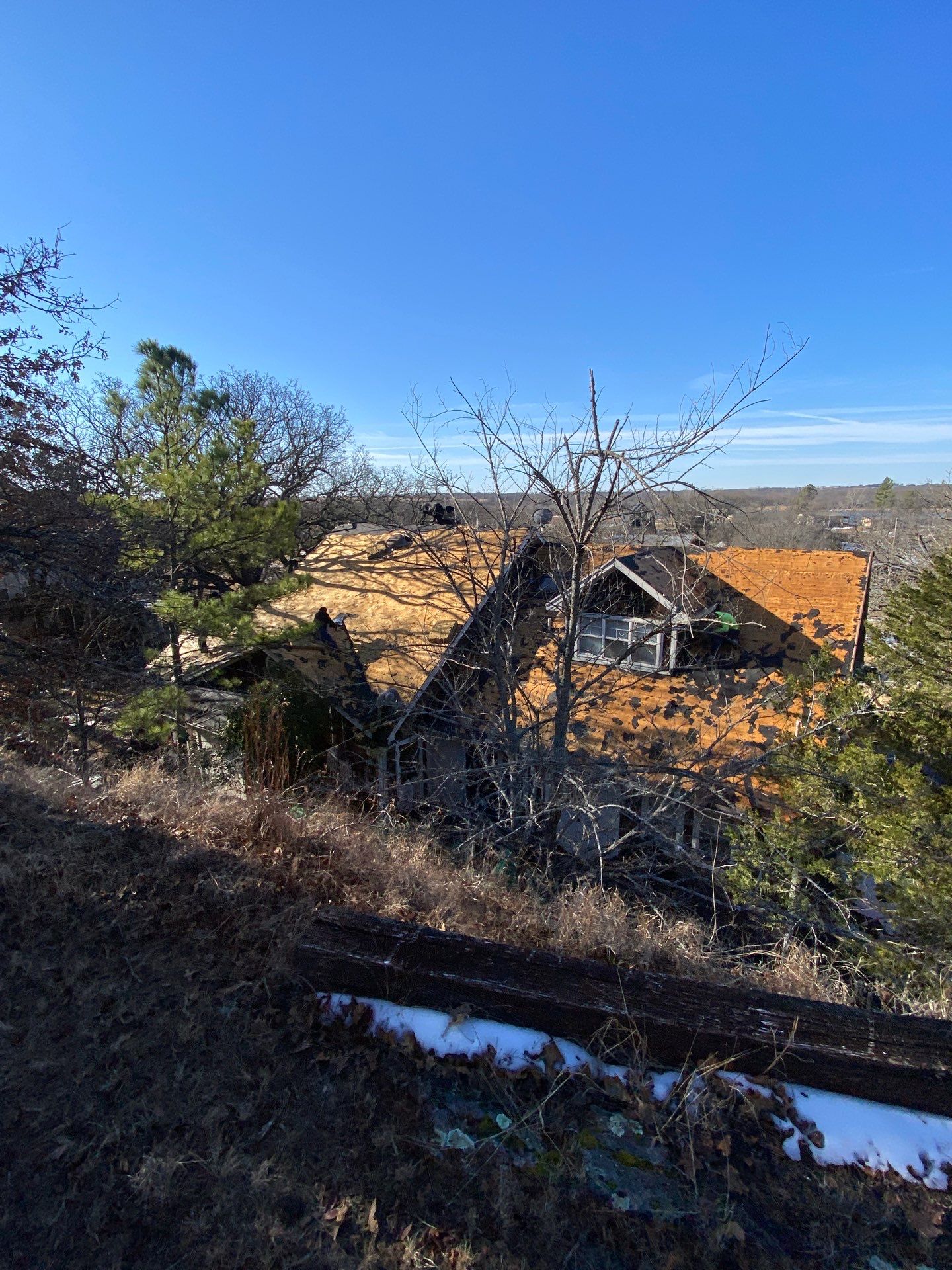Roof Replacement on a private lake near Ardmore by BANA Roofing and Solar Supply