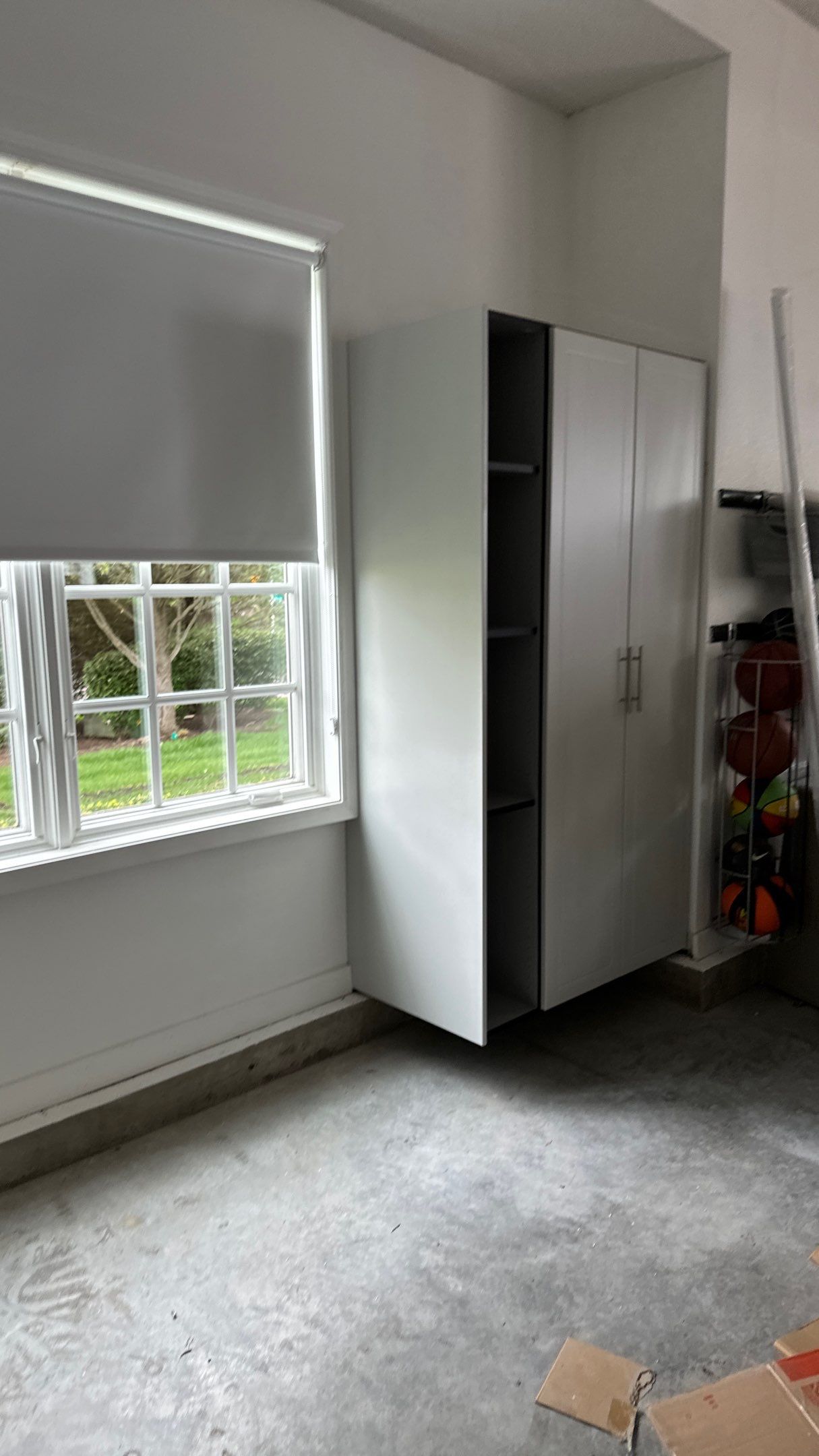 Brooke L. added cabinets for a clean storage look by Banner Garage