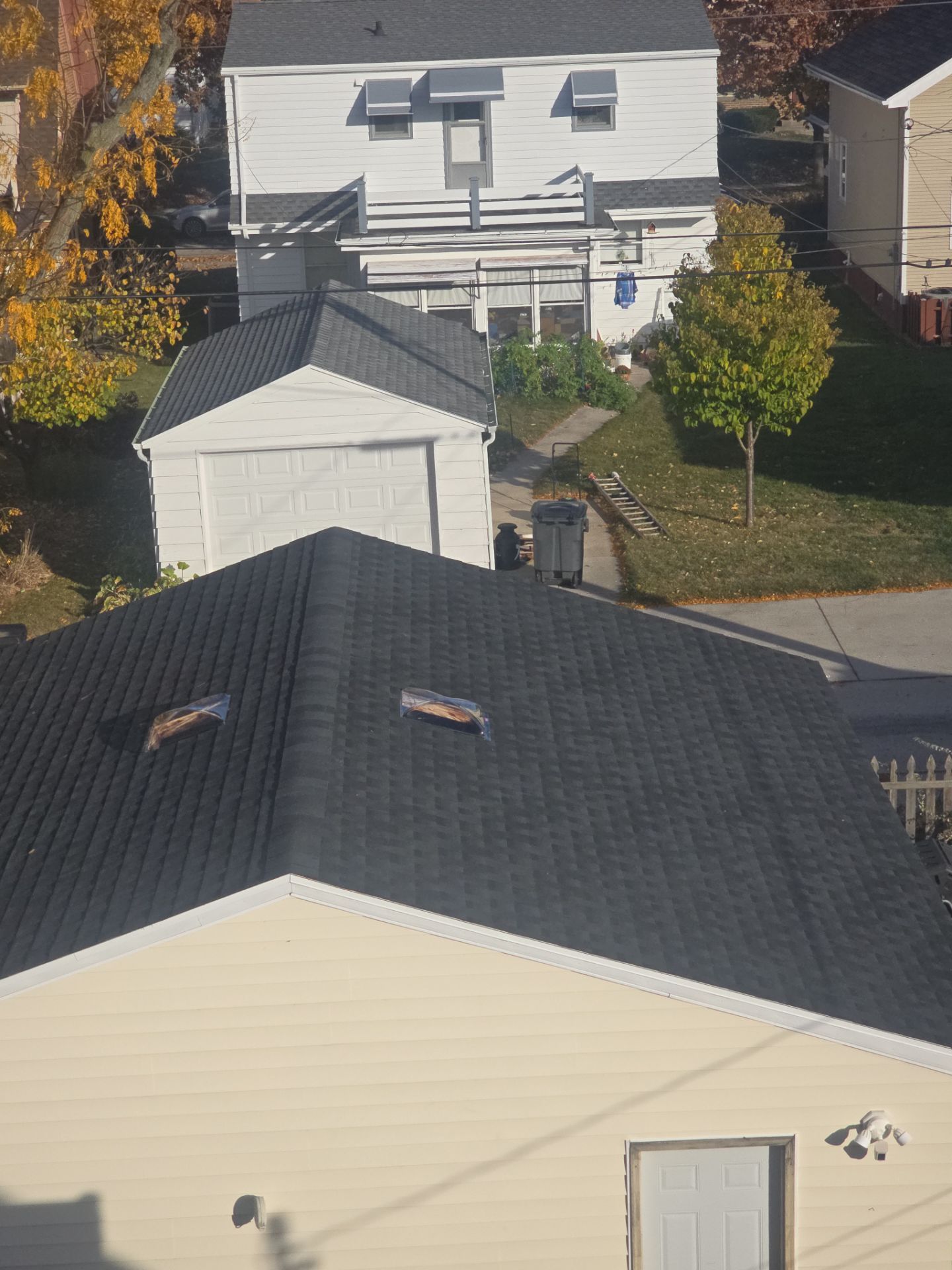 House, Garage, and Skylight Roof Replacement with GAF HDZ Charcoal Shingles and Gutter Protection by Gellings Roofing & Siding