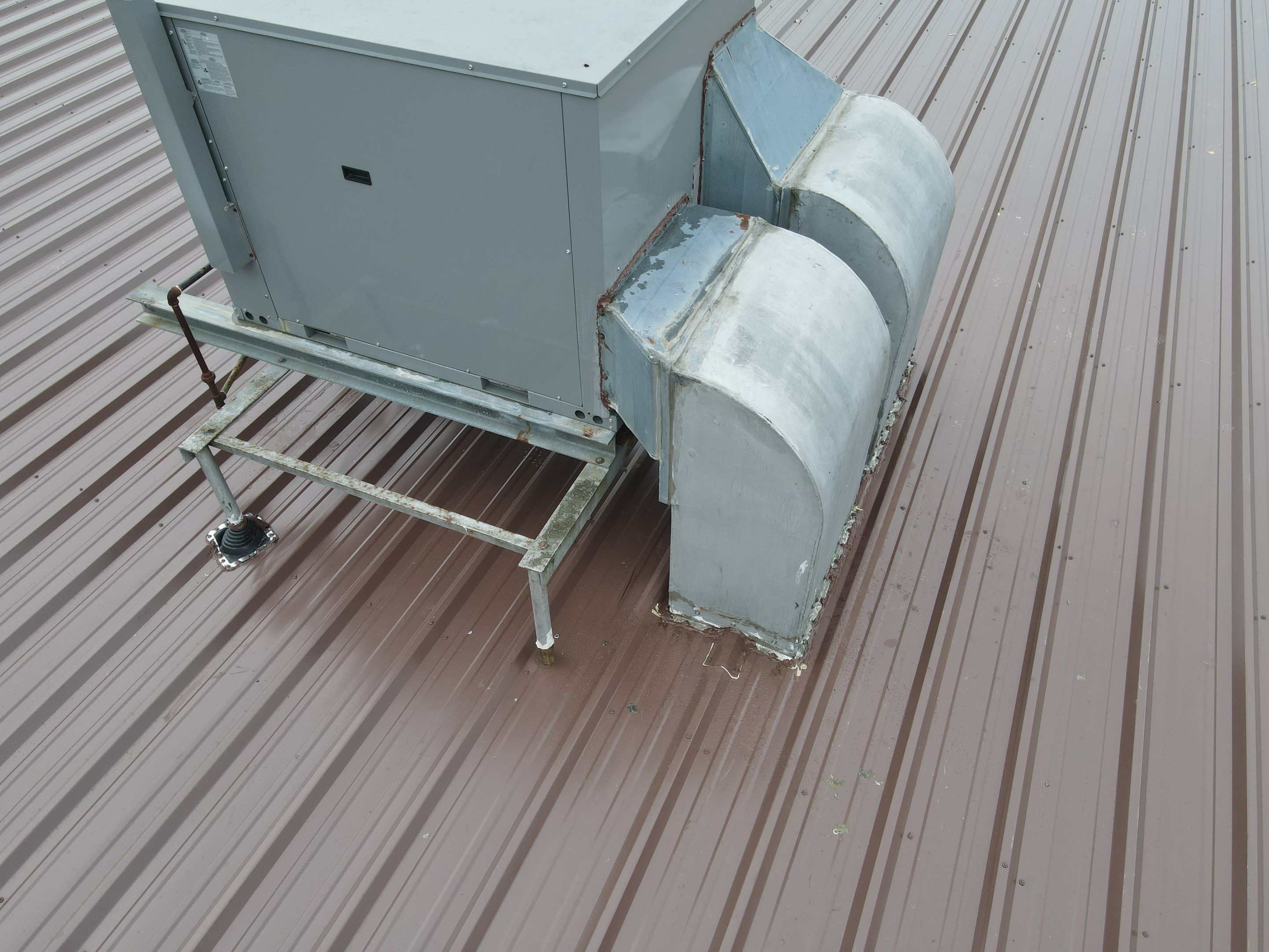 Commercial Roofing Installation using Metal by Rainstoppers Roofing