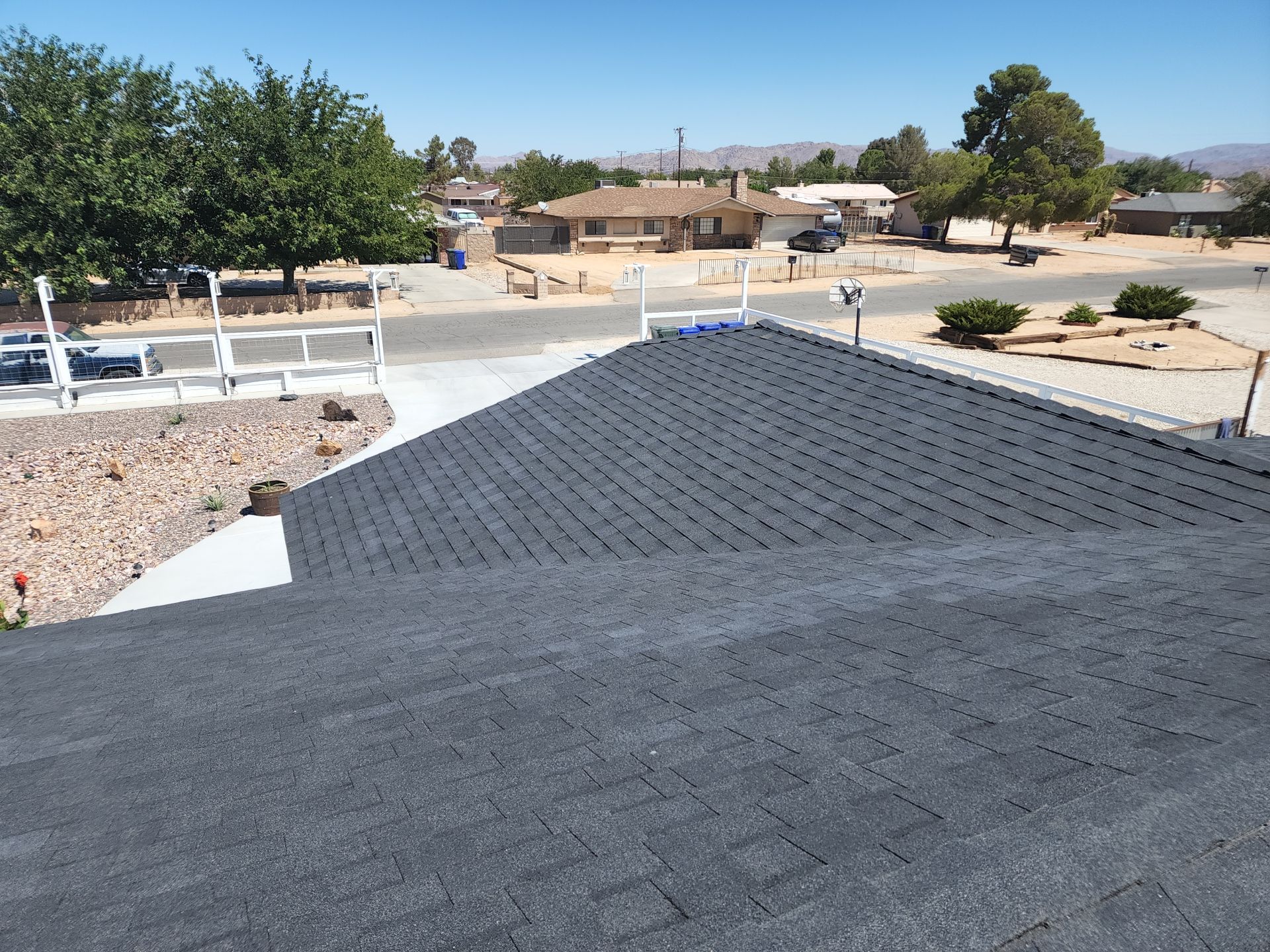Onyx Black Shingles by Reimagine Roofing