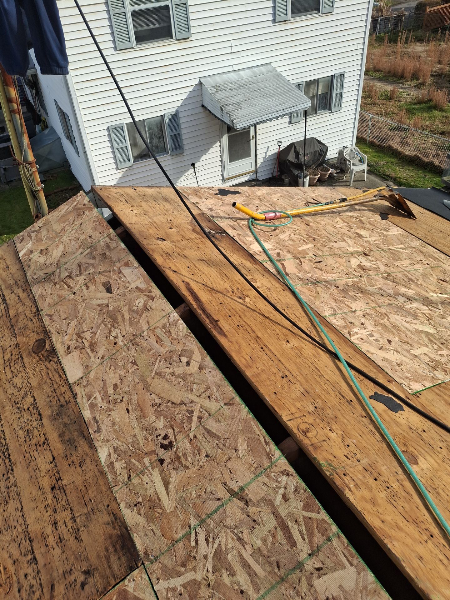 Residential Roofing Installation using GAF Timberline HDZ Oyster Grey by Rainstoppers Roofing