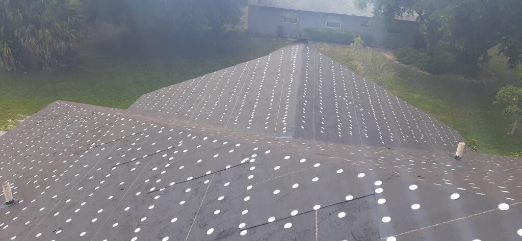 Residential Roofing Installation using 1" Nail strip metal roof by BLUES BROTHERS ROOFING