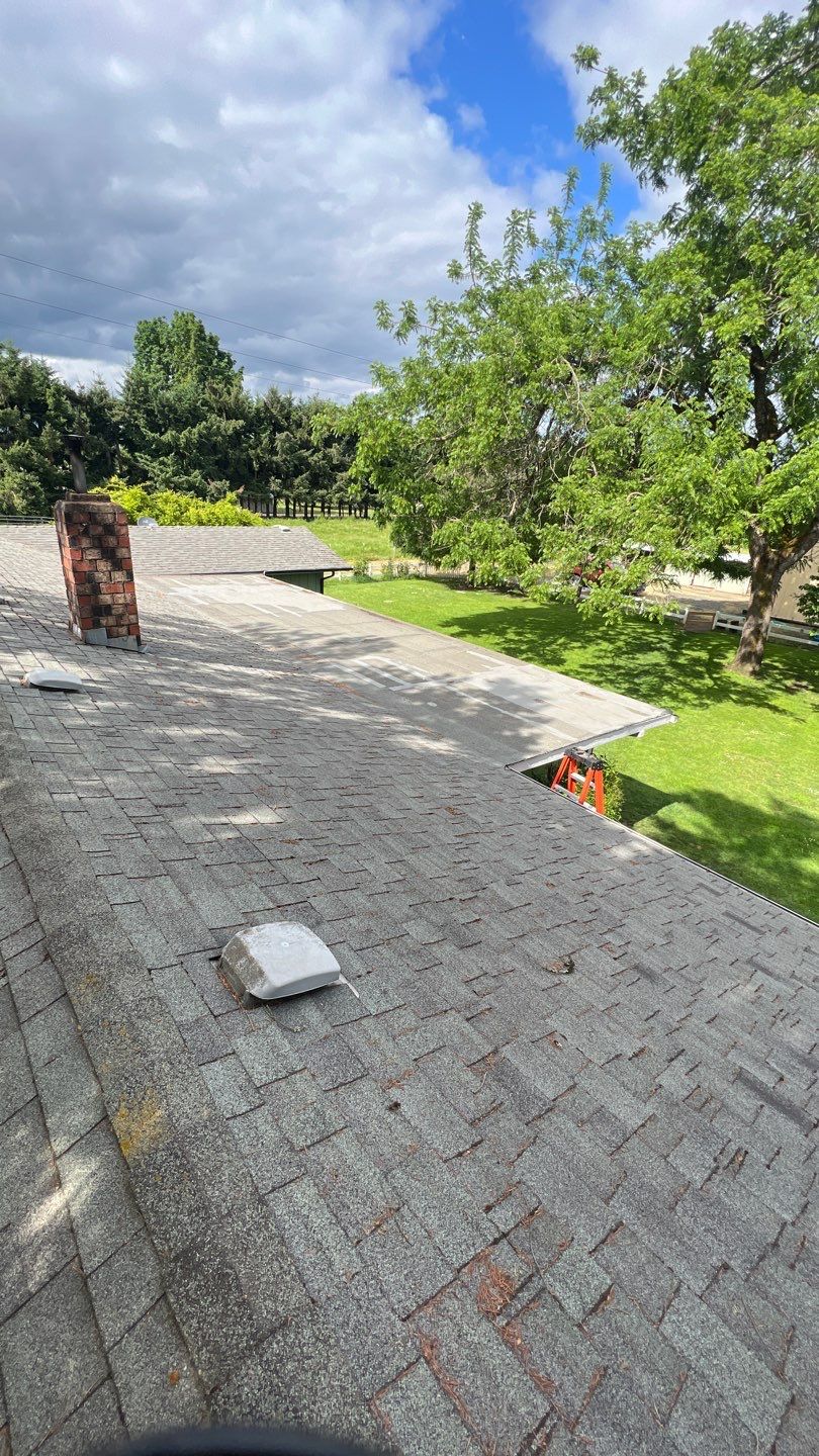 Residential Roofing Installation using IKO Dynasty (Color: Granite Black) by Orezona Building & Roofing Company, Inc.