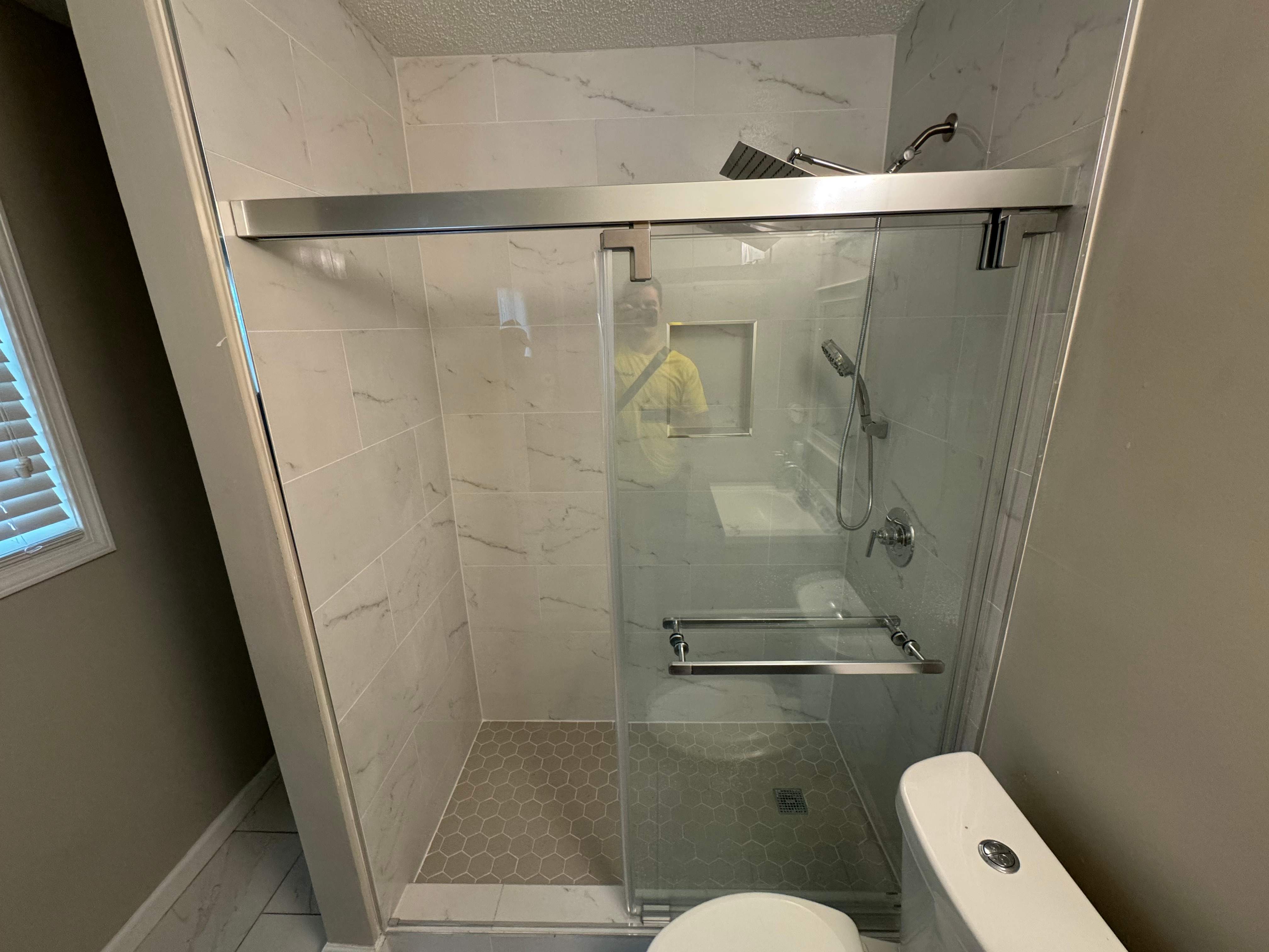 Tub to walk-in shower conversion by Prudencio