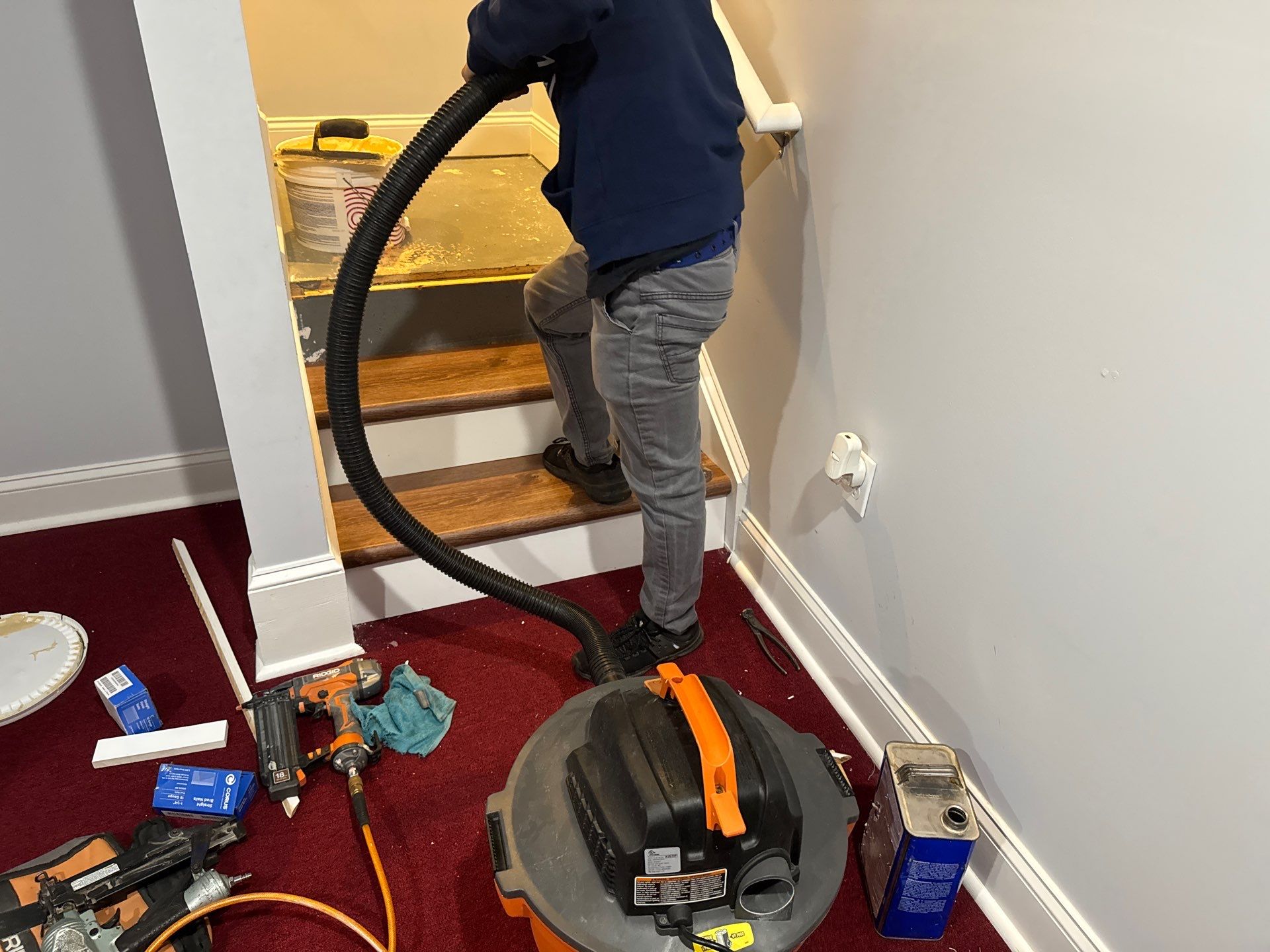 Stairway Installation using t vinyl stair tread and reversibleriser by La Bendicion Contruction Llc