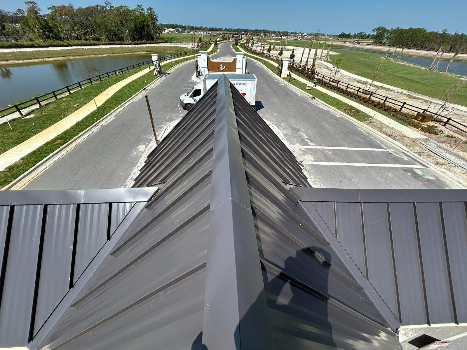 24ga 1.5" Mechanical Seam Dark Bronze by Total Roofing System The Metal Roof Experts