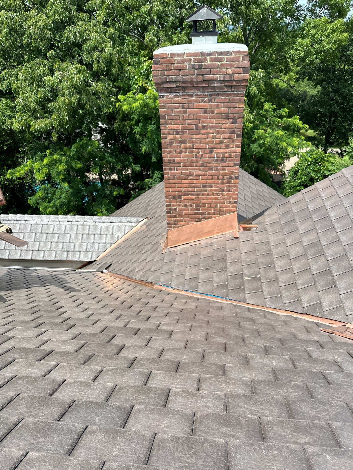 Residential Roofing Installation Using Enviroshake Synthetic Slate by Undersun Roofing 