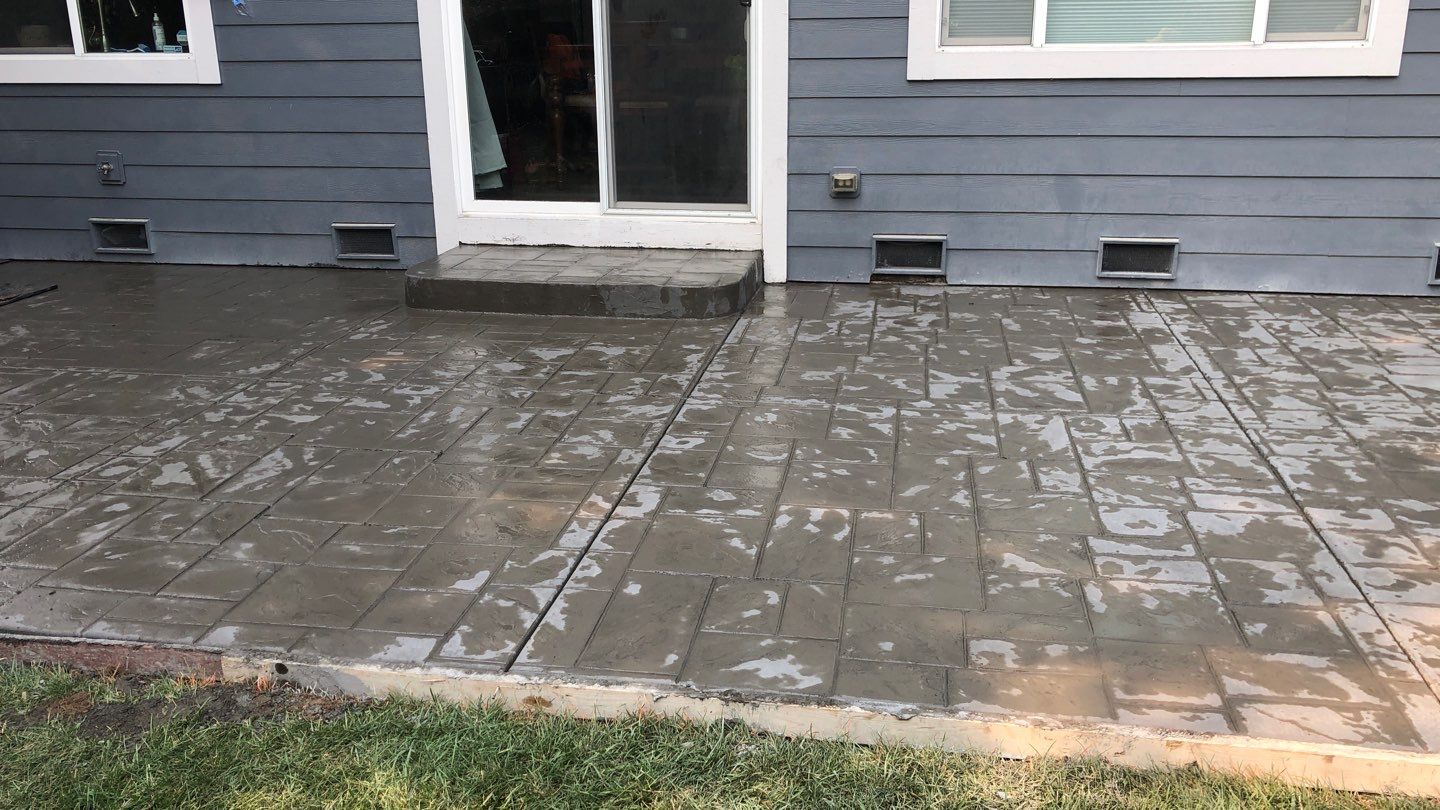  Amy | Stamped Finish Patio, Concrete Project by Jireh Asphalt & Concrete Inc 