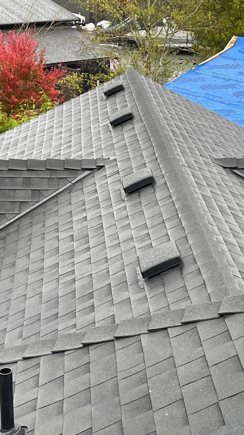 Residential Roofing Installation using OC Oakridge shingles with prolok accent roofs by Top Notch Roofing Inc