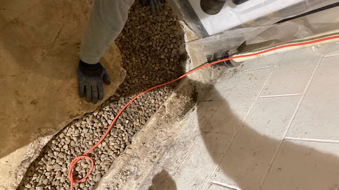 Drain tile & a sump pump for Ruth by Waterproofing Northeast